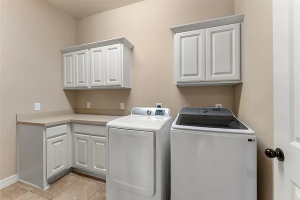 a front view of a house with a yard and porch