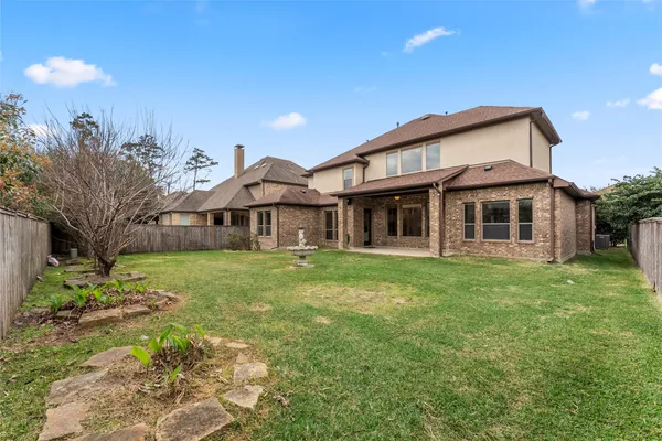 a house view with a garden space