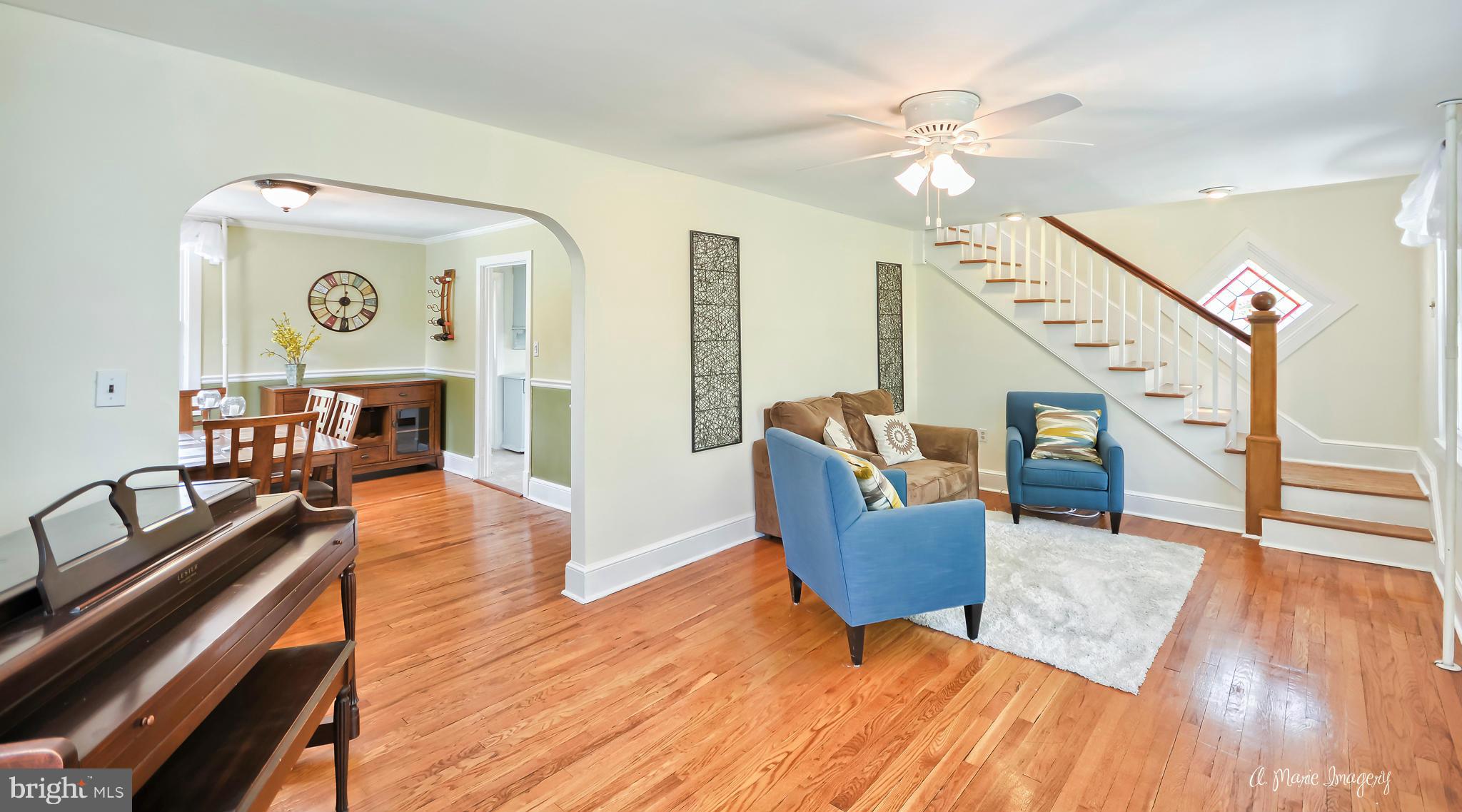 1651 Shookstown Road Frederick, MD 21702 - Photo 2 of 30 a living room with furniture and a wooden floor