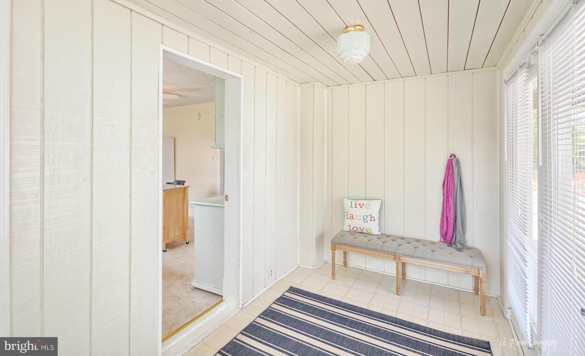 1651 Shookstown Road Frederick, MD 21702 - Photo 11 of 30 a view of wooden floor and windows in a room