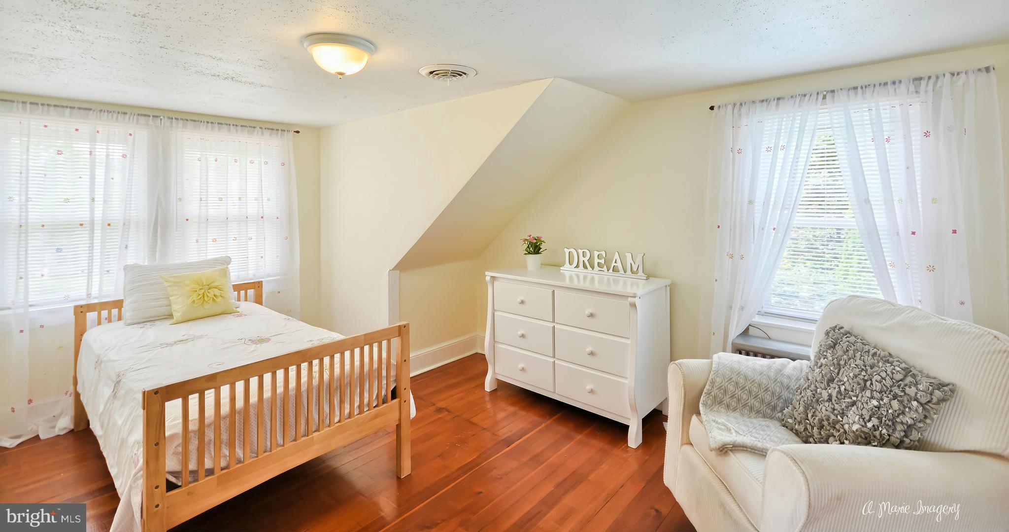 1651 Shookstown Road Frederick, MD 21702 - Photo 14 of 30 a bedroom with a bed and a window