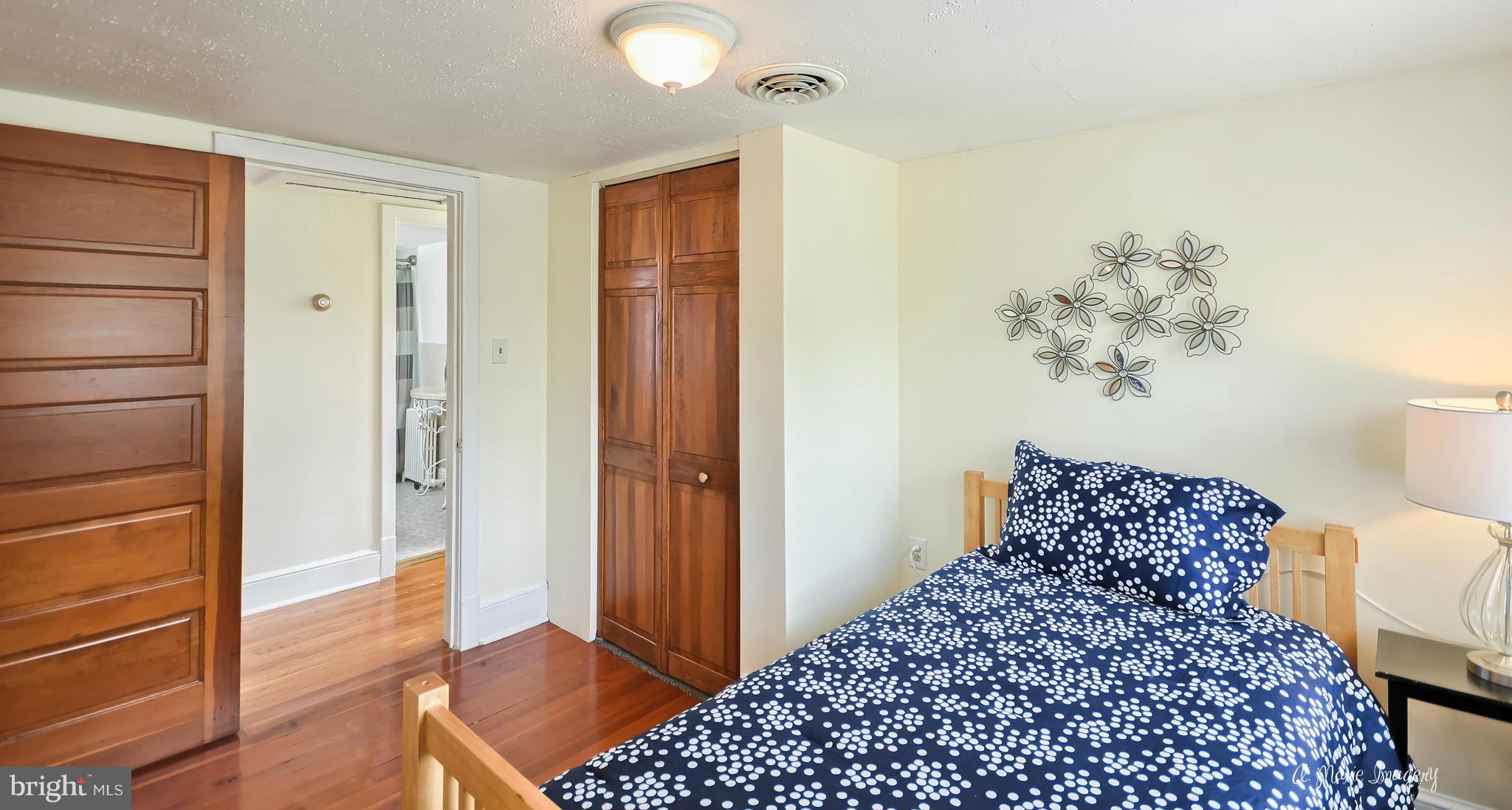1651 Shookstown Road Frederick, MD 21702 - Photo 15 of 30 a bedroom with a bed and a window