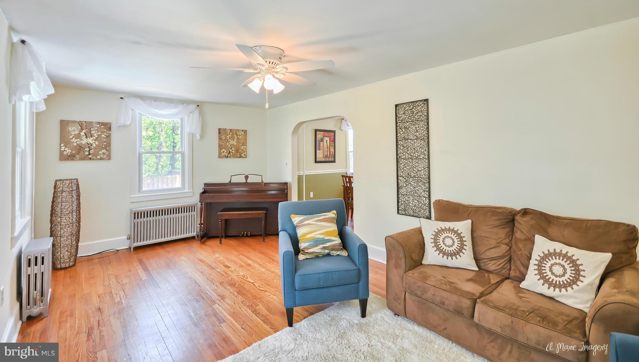 1651 Shookstown Road Frederick, MD 21702 - Photo 3 of 30 a living room with furniture and a wooden floor