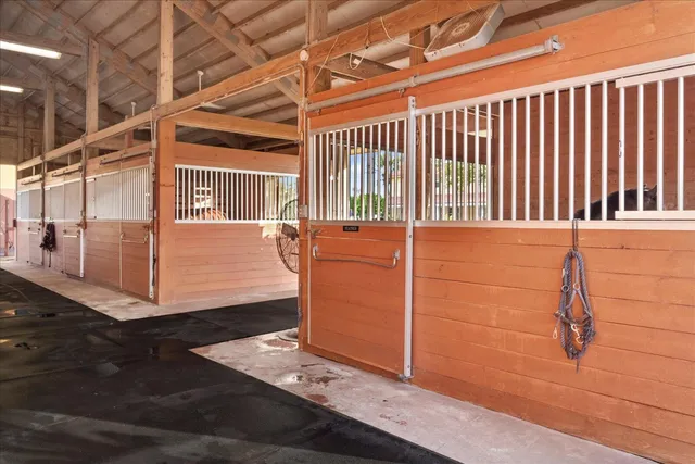 a view of a porch with wooden floor