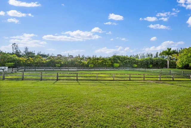 a view of a golf course with a lake