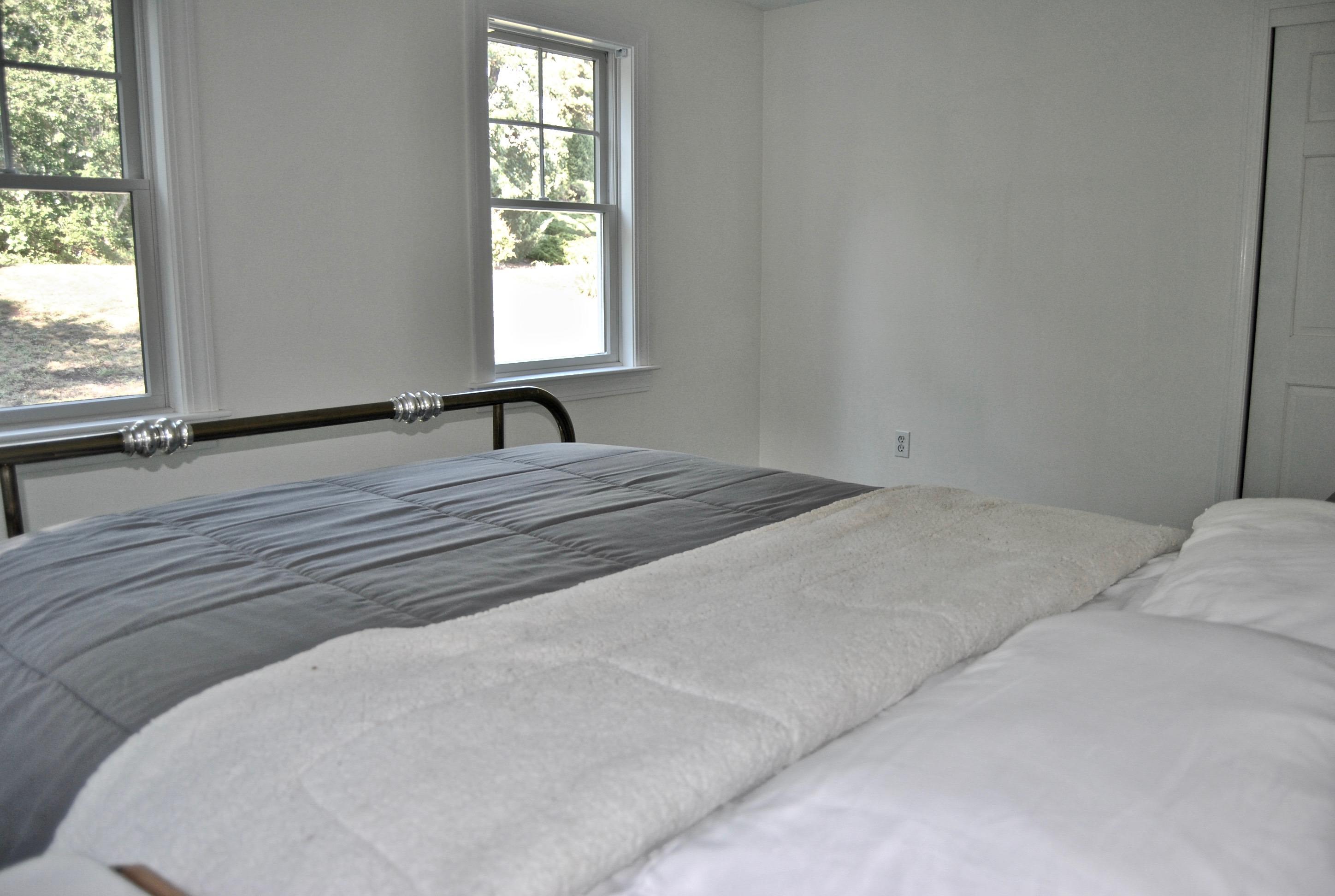 46 Partridge Path Chatham, MA 02633 - Photo 17 of 42 a bedroom with a bed and a window