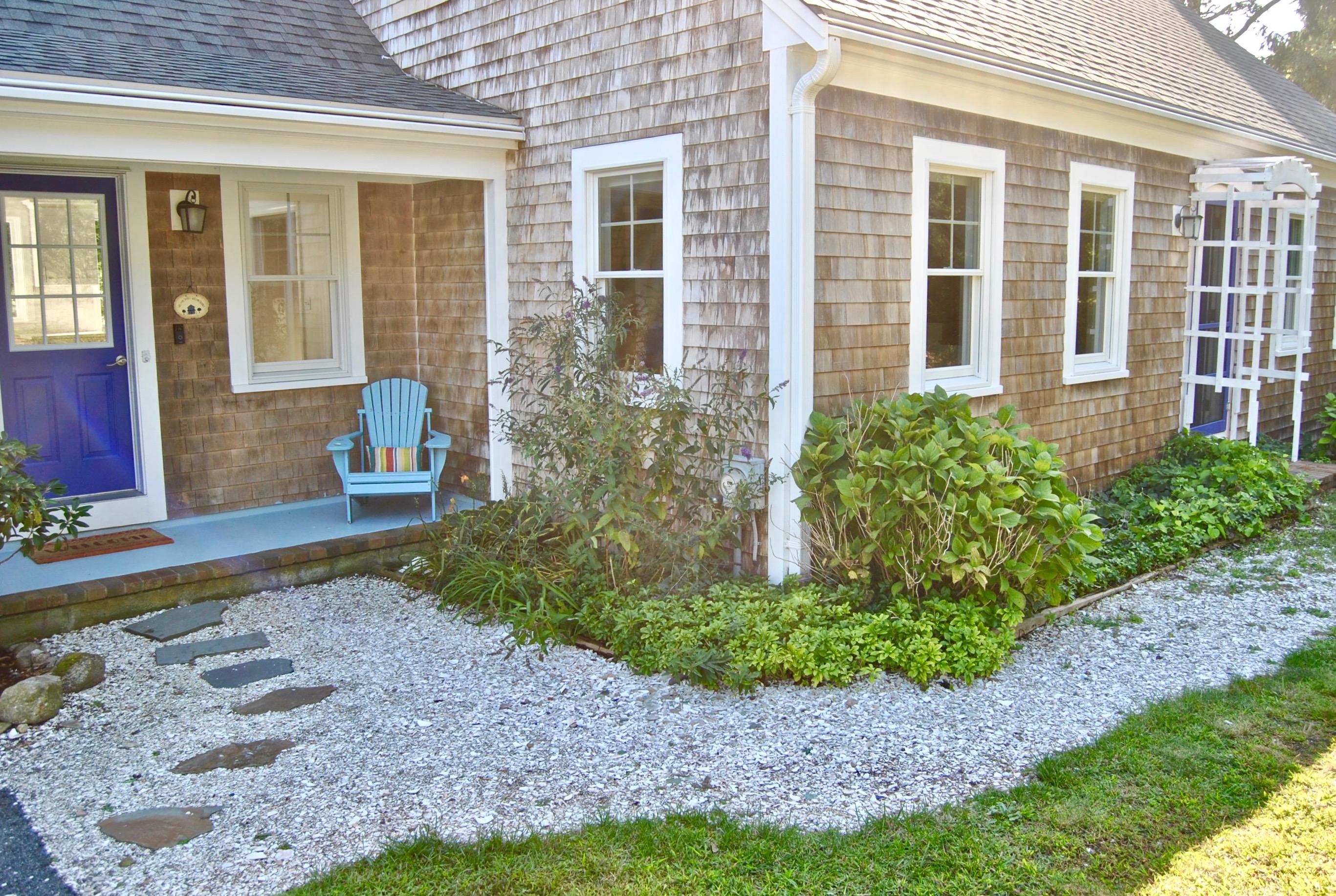 46 Partridge Path Chatham, MA 02633 - Photo 3 of 42 a front view of a house with garden