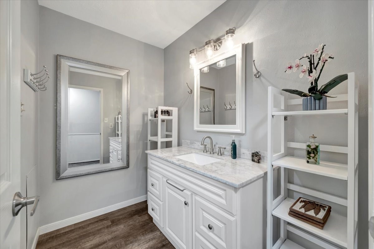 2610 Loganberry Circle Seabrook, TX 77586 - Photo 28 of 35 a bathroom with a sink and a mirror