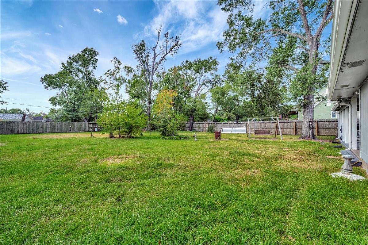 2610 Loganberry Circle Seabrook, TX 77586 - Photo 31 of 35 a view of yard with grass and trees