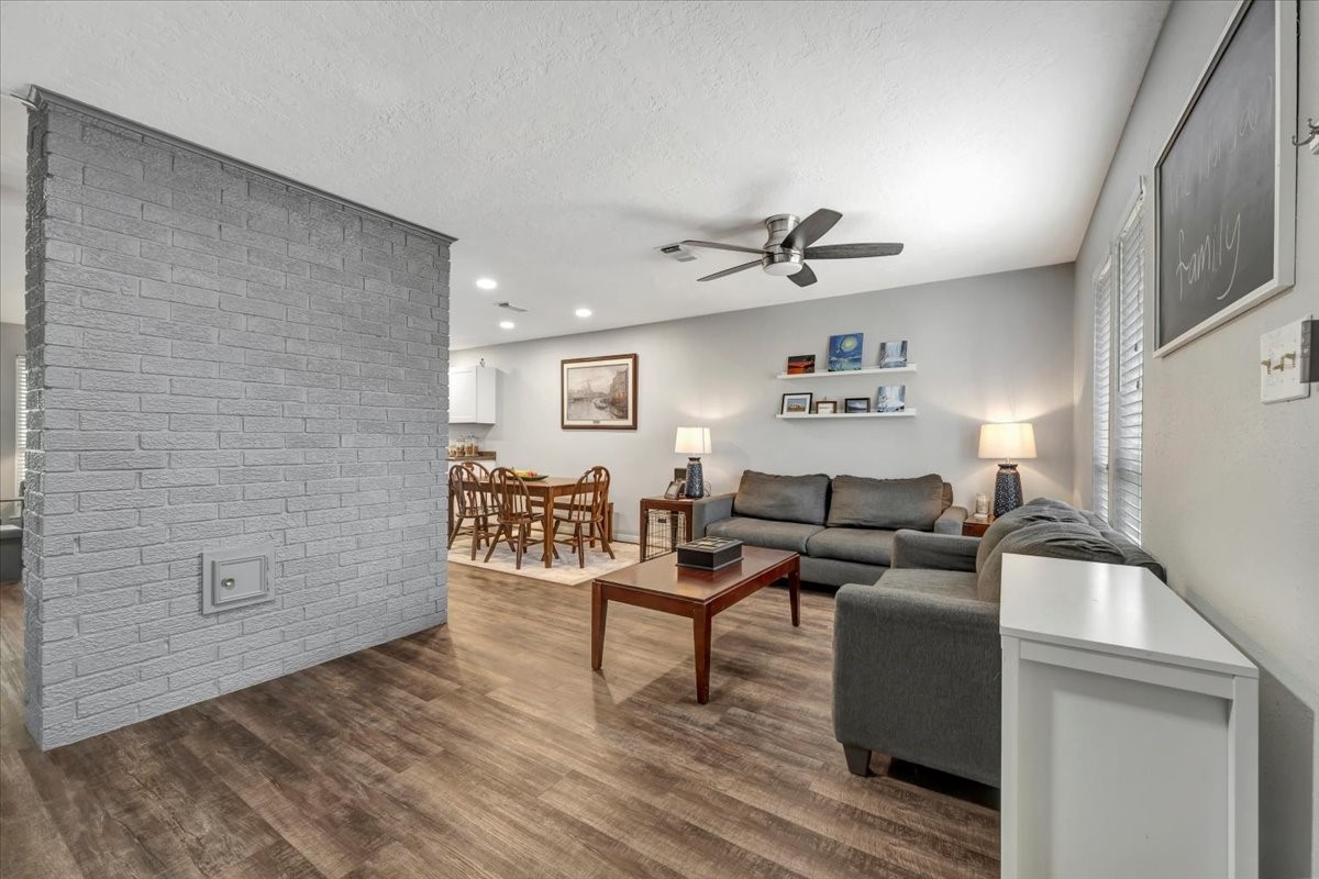 2610 Loganberry Circle Seabrook, TX 77586 - Photo 4 of 35 a living room with furniture and wooden floor