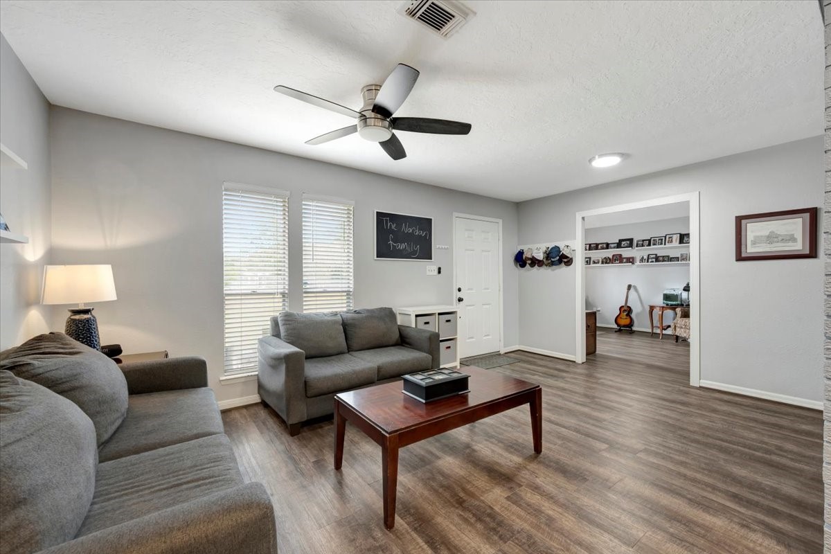 2610 Loganberry Circle Seabrook, TX 77586 - Photo 6 of 35 a living room with furniture and a wooden floor