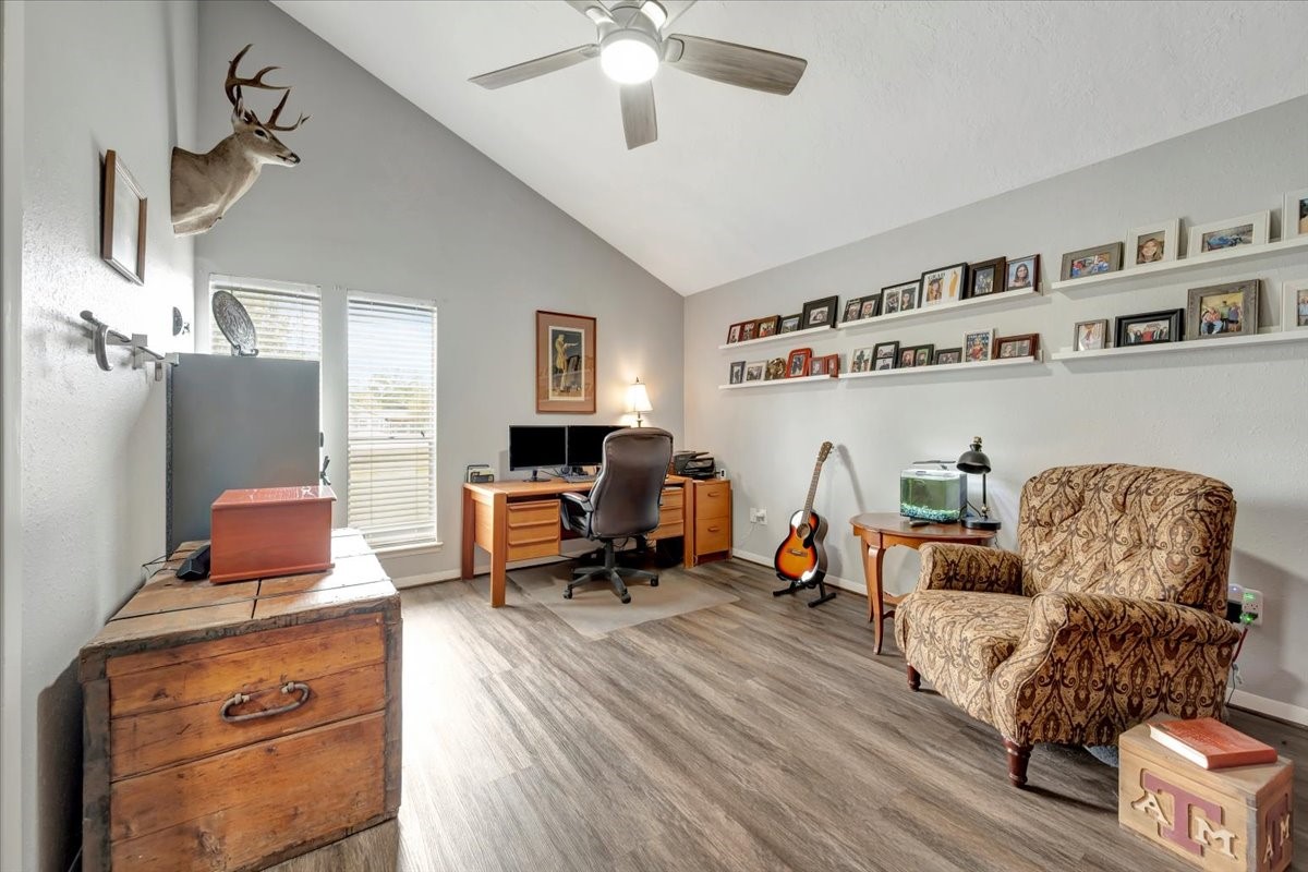 2610 Loganberry Circle Seabrook, TX 77586 - Photo 9 of 35 a living room with furniture and a fireplace