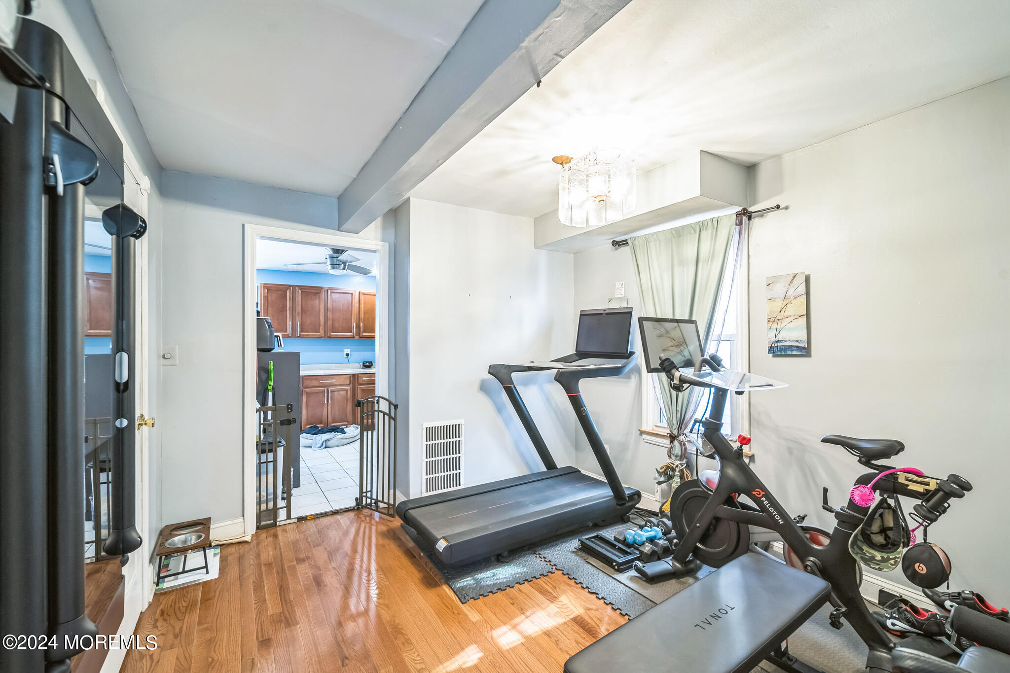 238 Branchport Avenue Long Branch, NJ 07740 - Photo 11 of 42 a view of a room with gym equipment