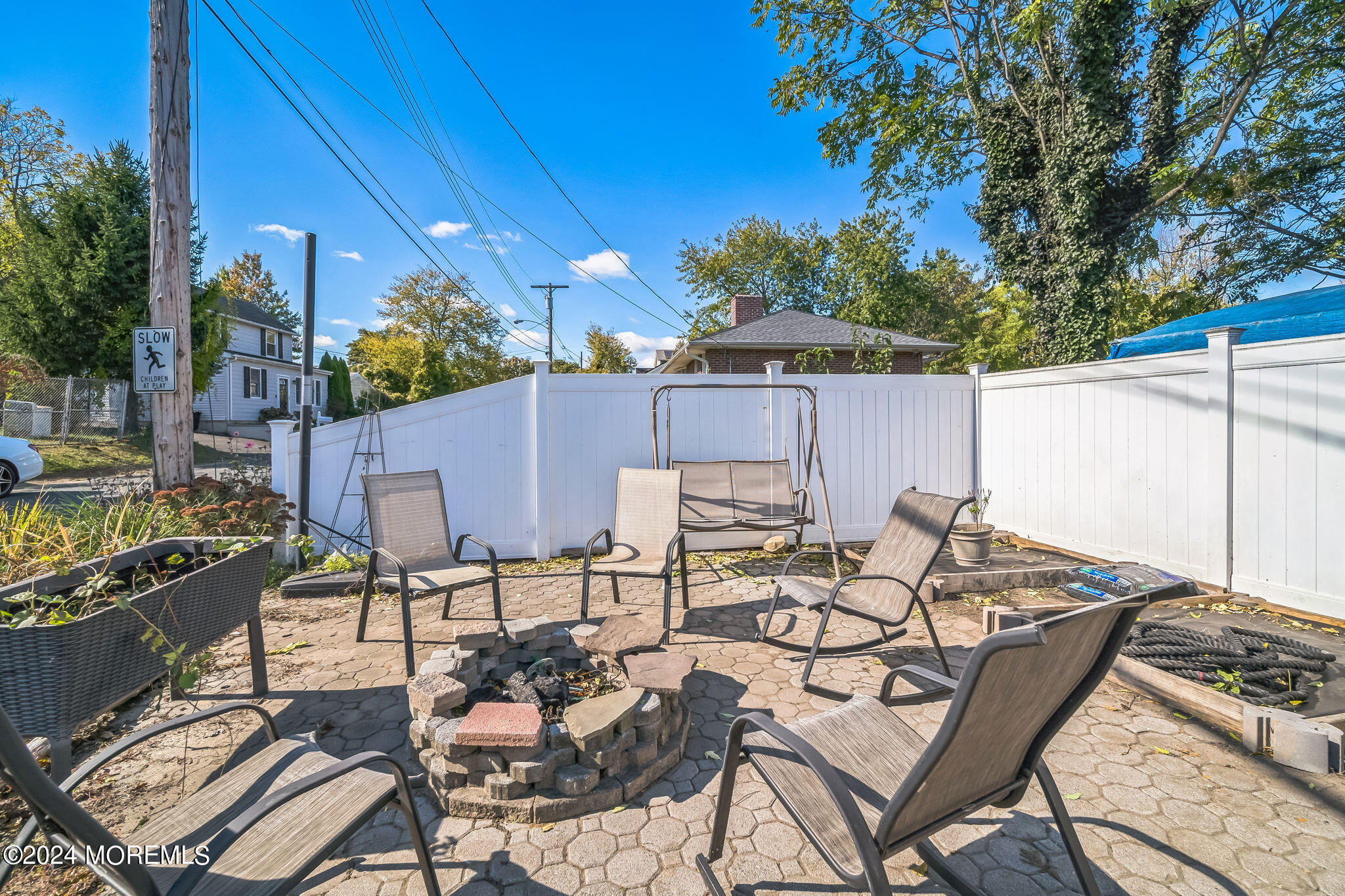 238 Branchport Avenue Long Branch, NJ 07740 - Photo 26 of 42 a view of a patio with table and chairs and potted plants