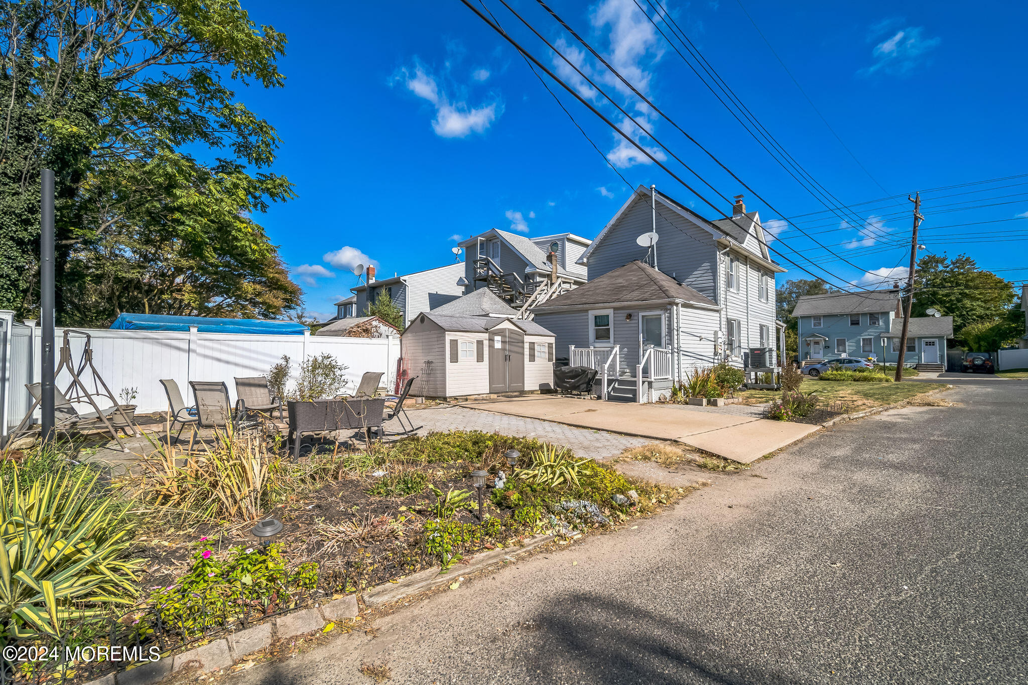 238 Branchport Avenue Long Branch, NJ 07740 - Photo 27 of 42 a front view of a house with a yard
