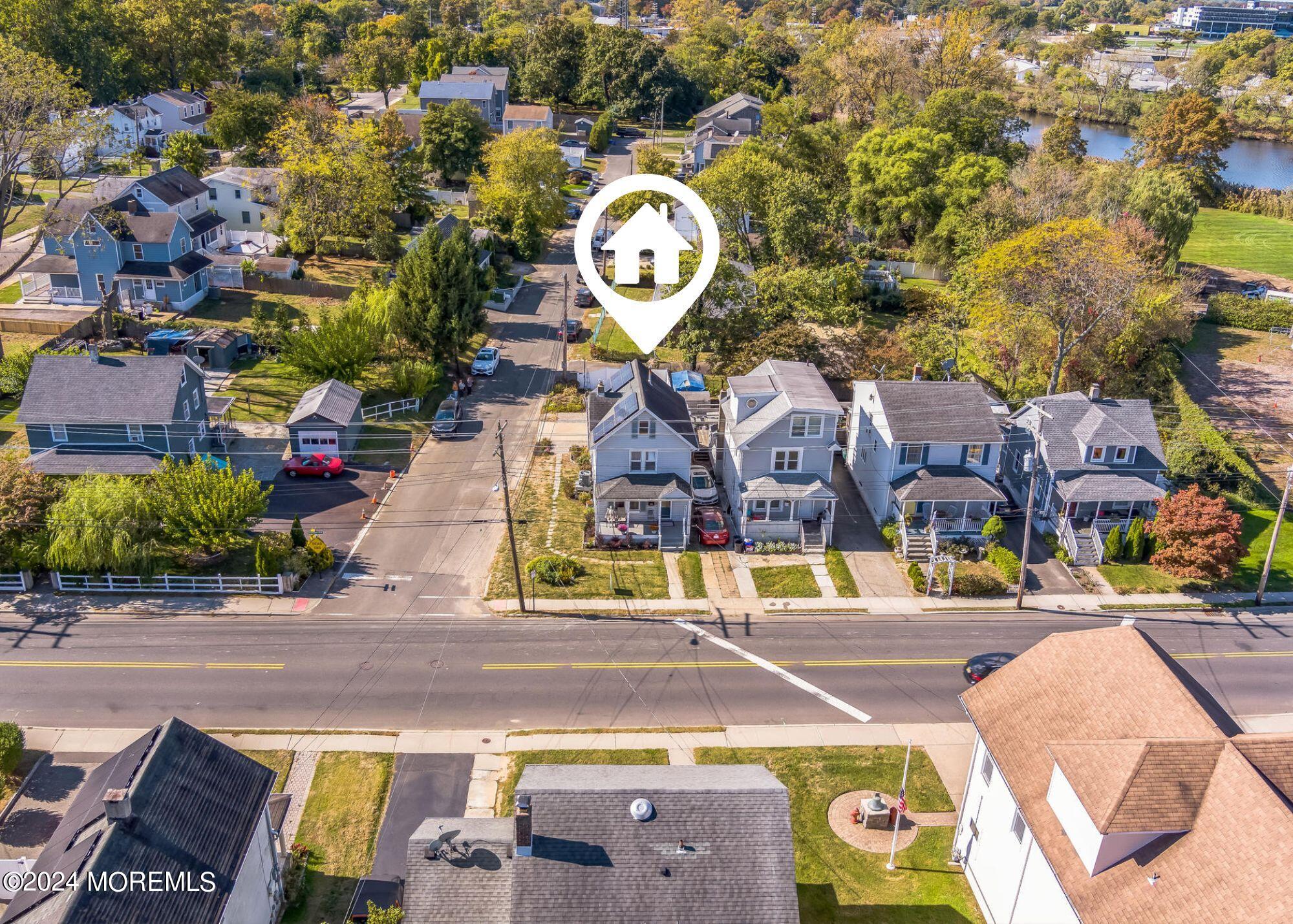 238 Branchport Avenue Long Branch, NJ 07740 - Photo 29 of 42 an aerial view of a house with a swimming pool