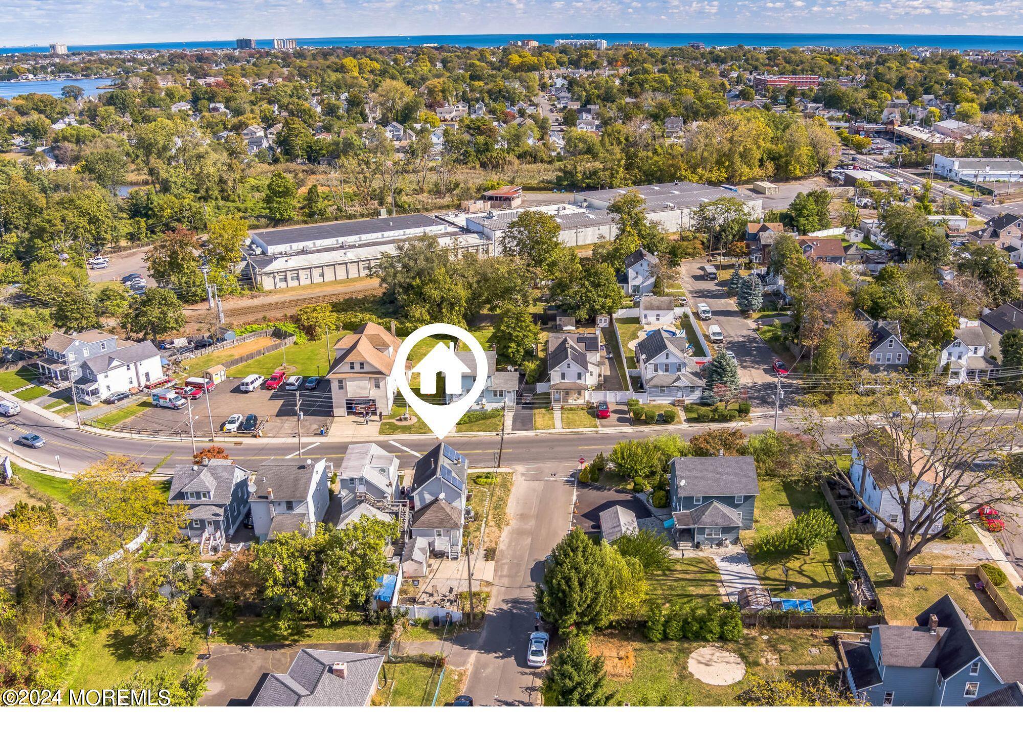 238 Branchport Avenue Long Branch, NJ 07740 - Photo 31 of 42 an aerial view of residential houses with outdoor space