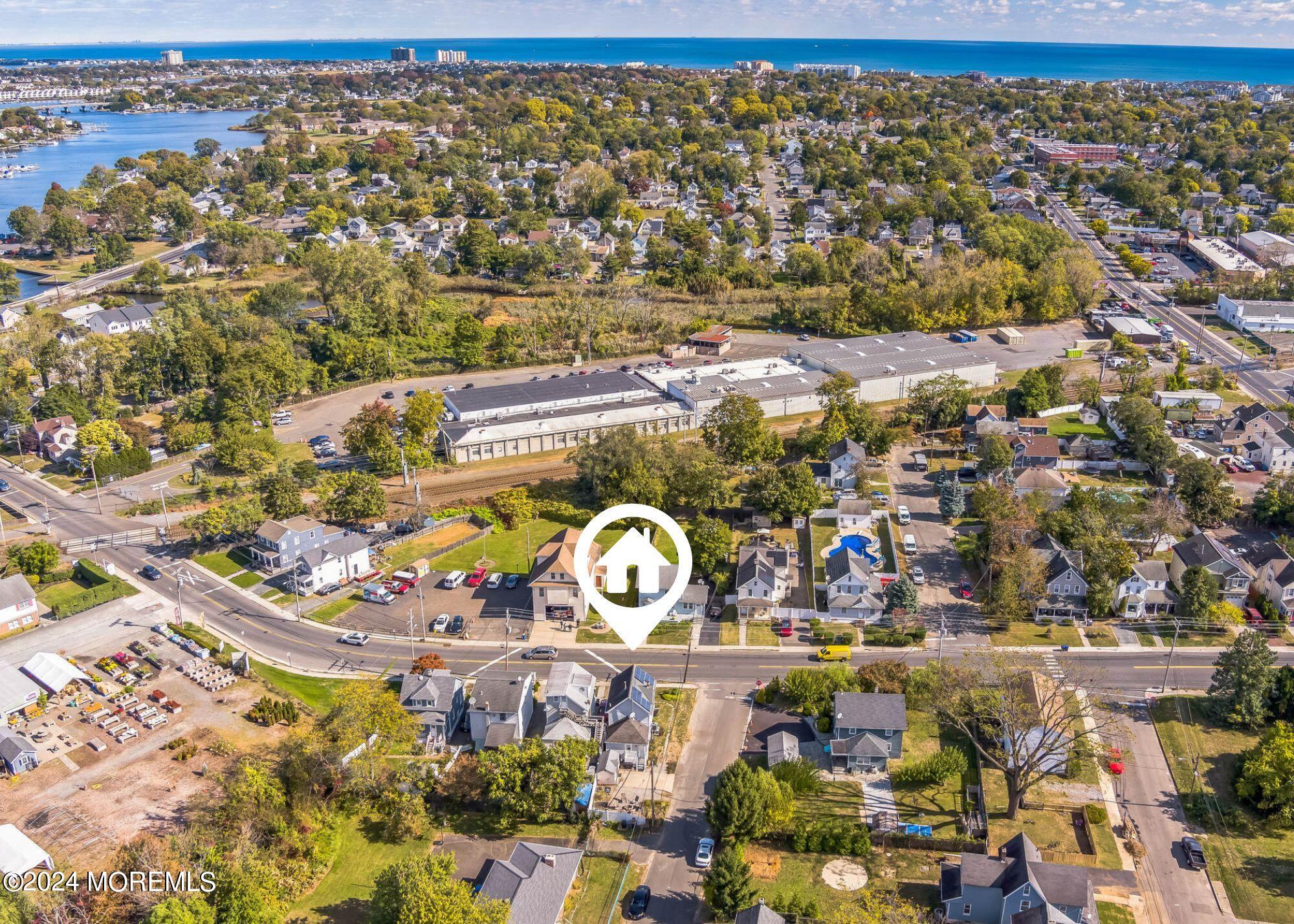 238 Branchport Avenue Long Branch, NJ 07740 - Photo 33 of 42 an aerial view of residential houses with outdoor space