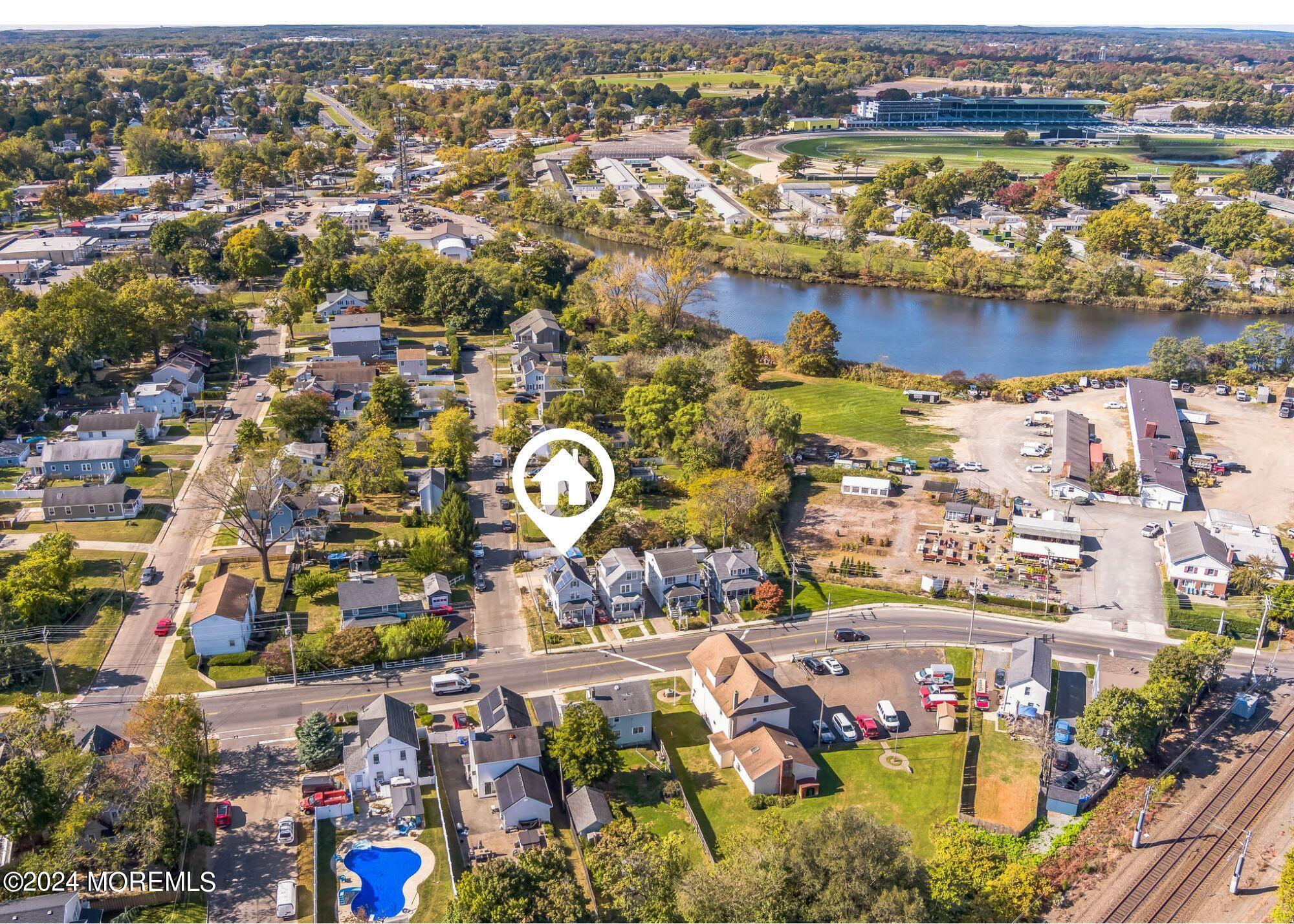 238 Branchport Avenue Long Branch, NJ 07740 - Photo 34 of 42 an aerial view of residential houses with outdoor space