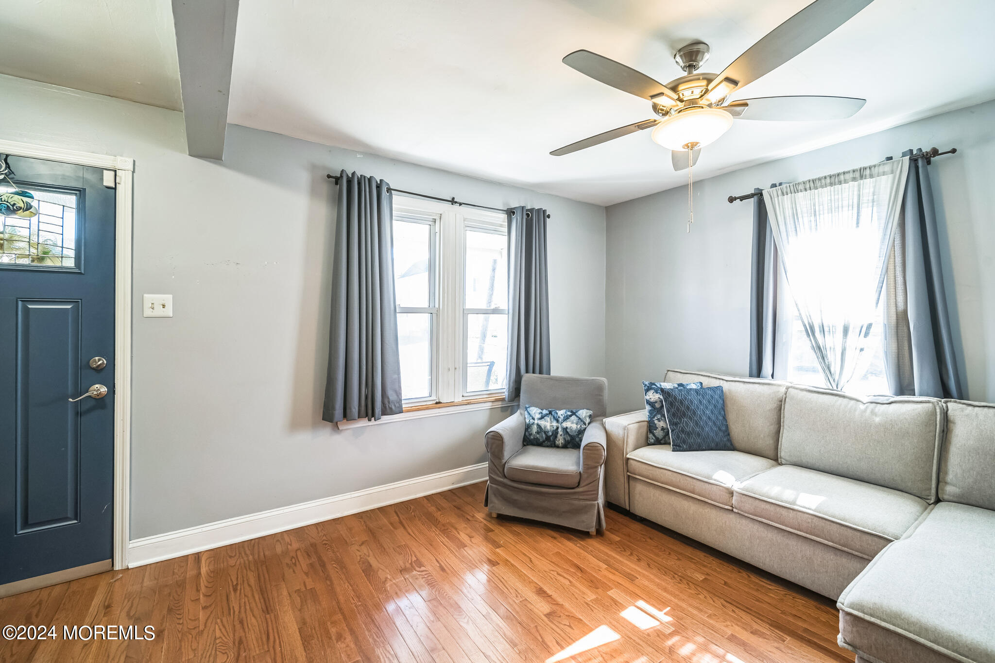 238 Branchport Avenue Long Branch, NJ 07740 - Photo 9 of 42 a living room with furniture and windows