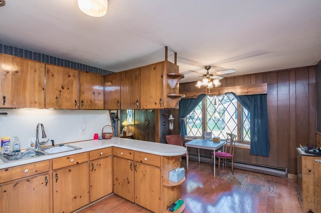 401 Stapleton Road Springfield, MA 01109 - Photo 11 of 35 a kitchen with a sink cabinets and window