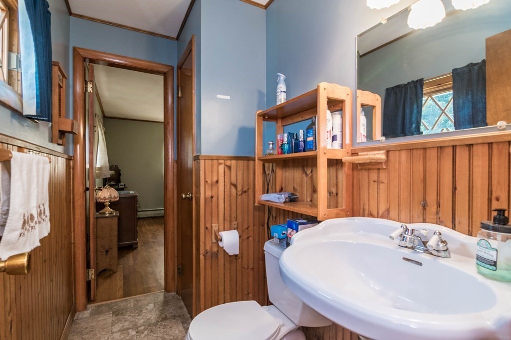401 Stapleton Road Springfield, MA 01109 - Photo 12 of 35 a bathroom with a sink a toilet and shower