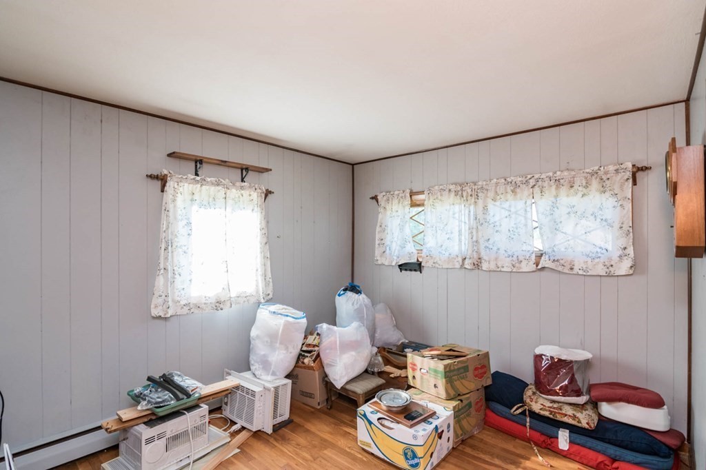 401 Stapleton Road Springfield, MA 01109 - Photo 16 of 35 a room with furniture and a window