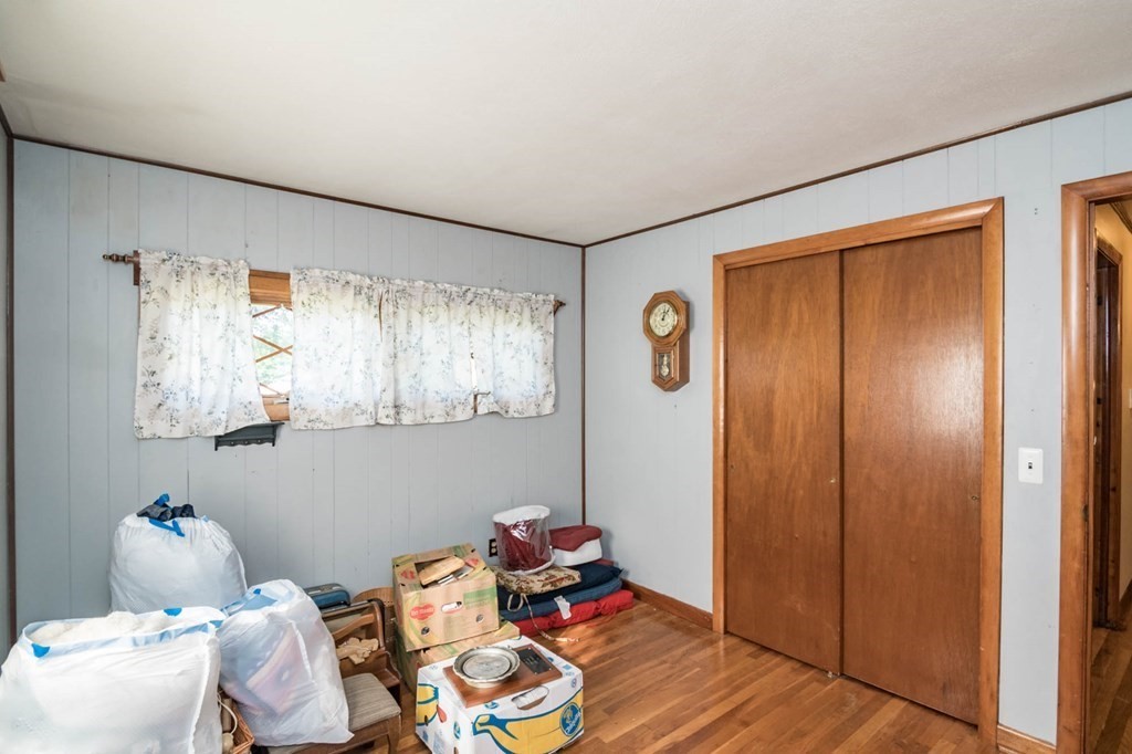 401 Stapleton Road Springfield, MA 01109 - Photo 17 of 35 a room with toys and wooden floor