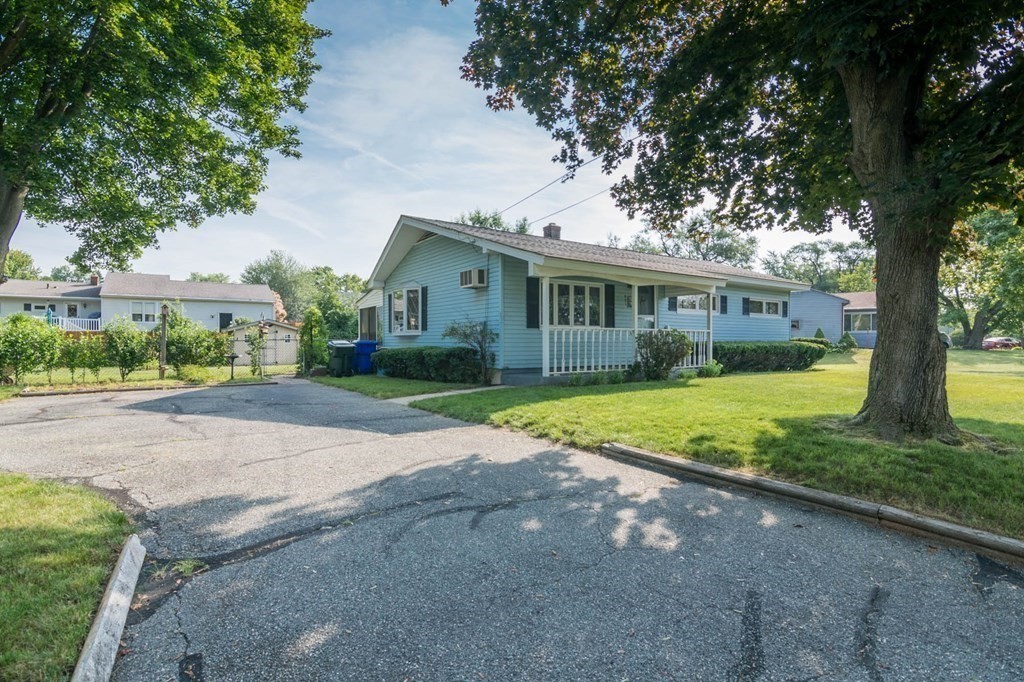 401 Stapleton Road Springfield, MA 01109 - Photo 2 of 35 a view of house with a yard