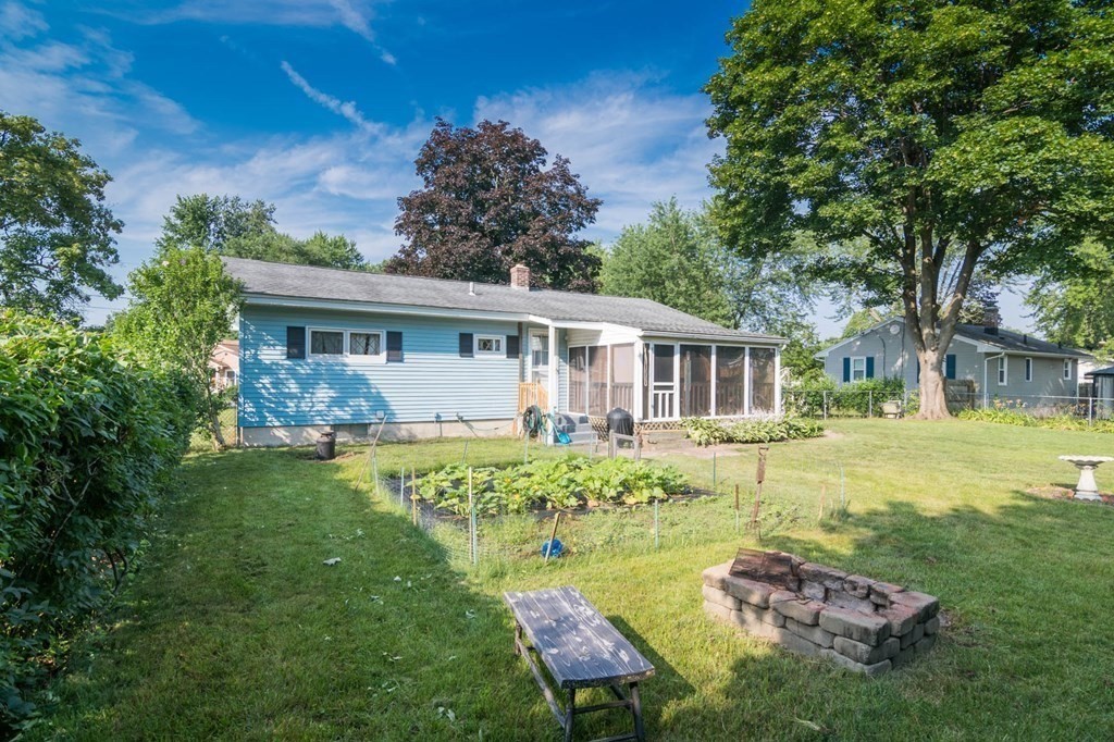 401 Stapleton Road Springfield, MA 01109 - Photo 29 of 35 a view of a house with backyard and a swimming pool