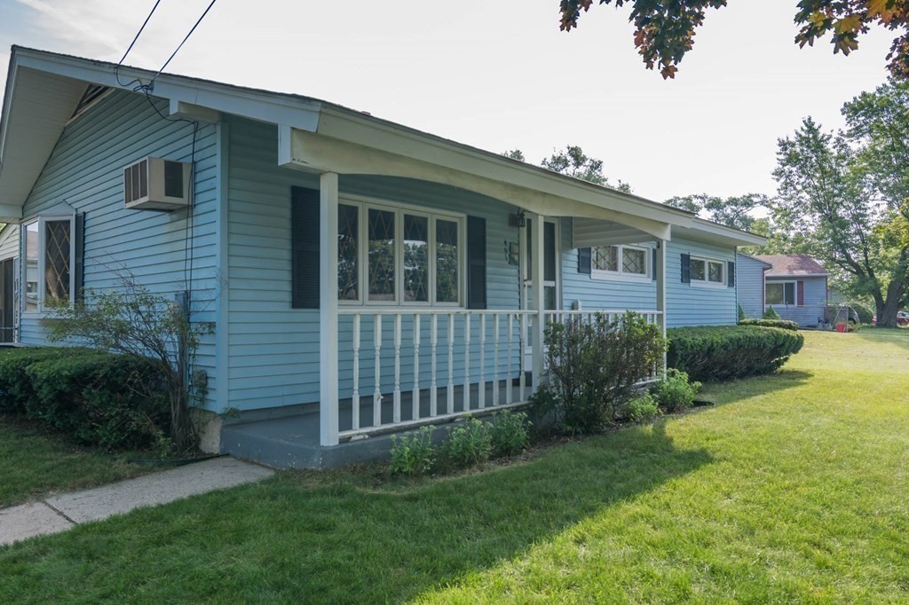 401 Stapleton Road Springfield, MA 01109 - Photo 3 of 35 a view of a house with a yard and plants