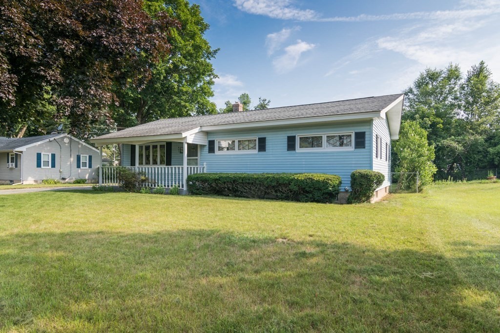 401 Stapleton Road Springfield, MA 01109 - Photo 4 of 35 a view of a house with a swimming pool