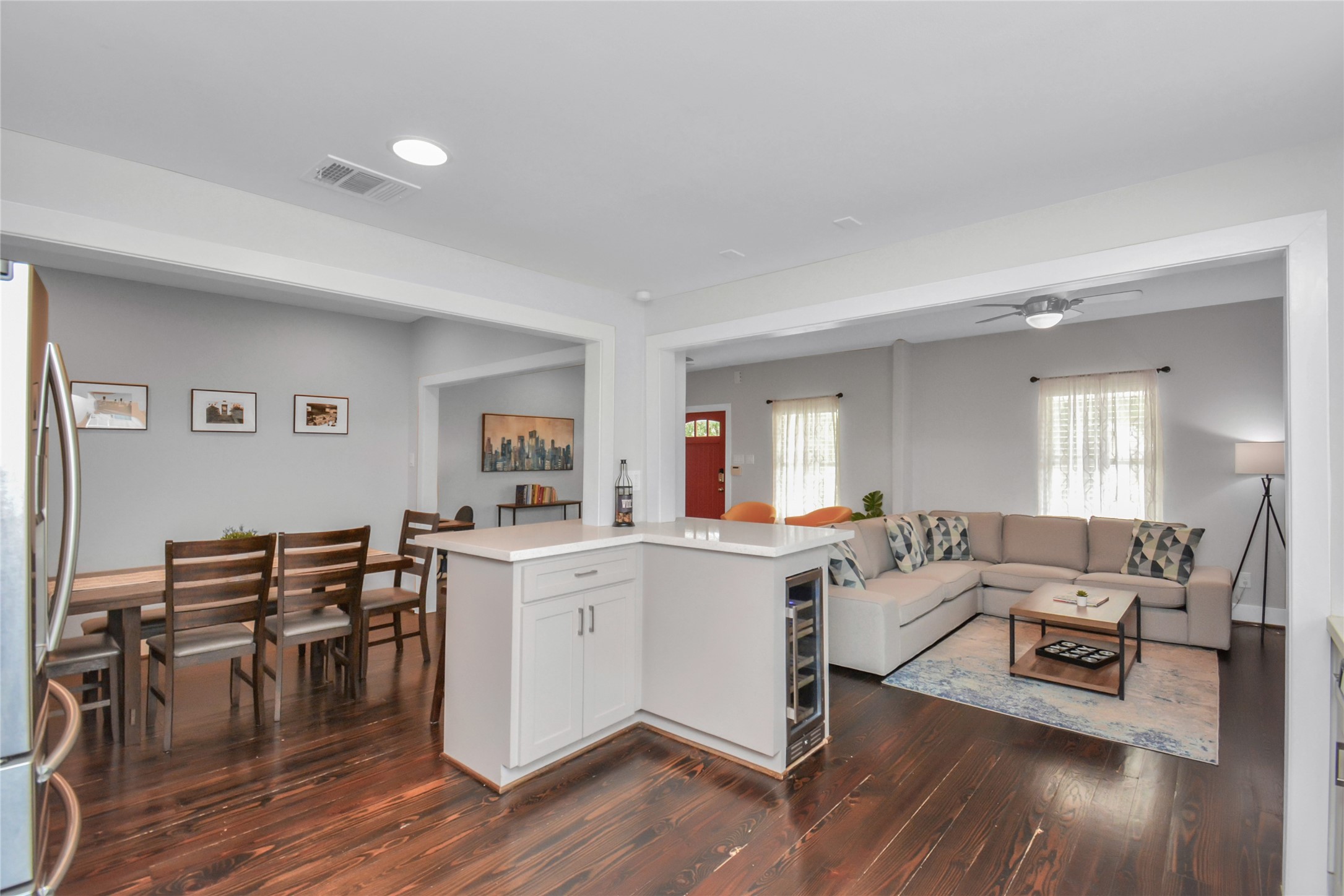 5705 Cochran Street Houston, TX 77009 - Photo 12 of 34 a living room with furniture and wooden floor