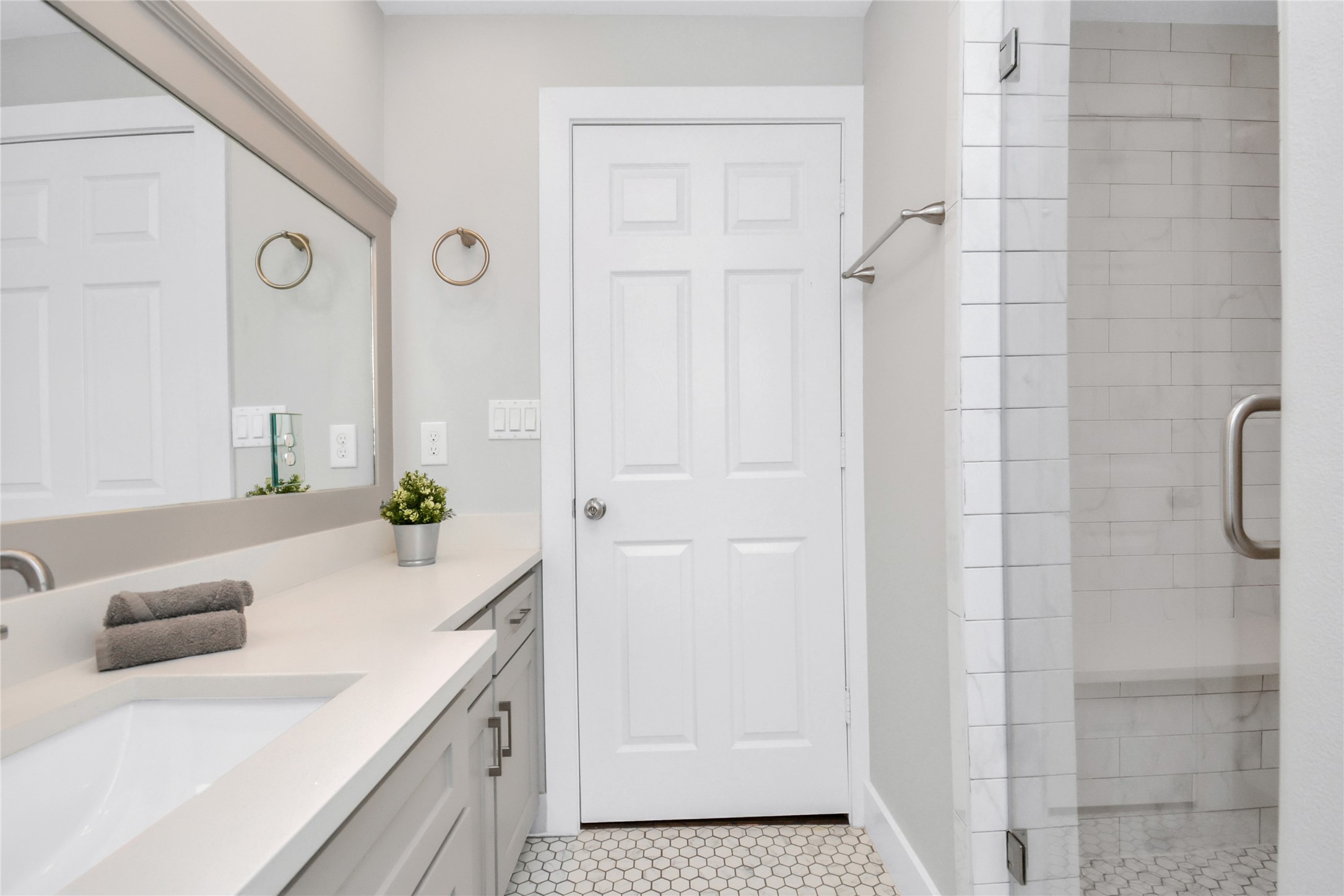 5705 Cochran Street Houston, TX 77009 - Photo 24 of 34 a bathroom with a granite countertop sink a toilet and shower