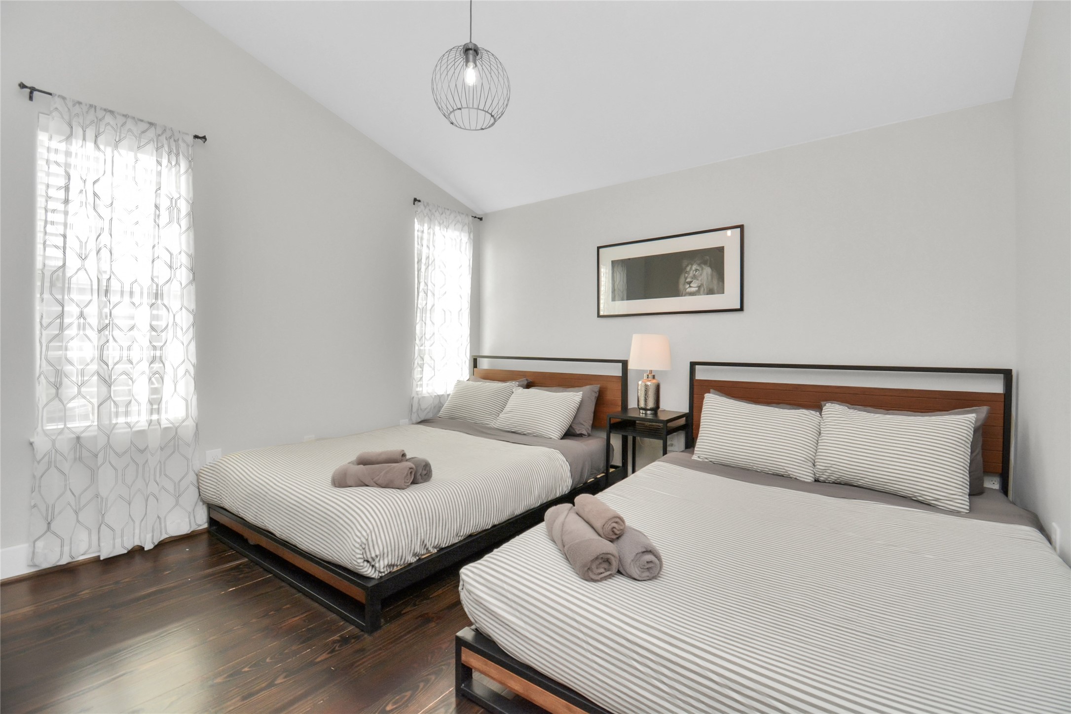 5705 Cochran Street Houston, TX 77009 - Photo 25 of 34 a bedroom with beds and a window