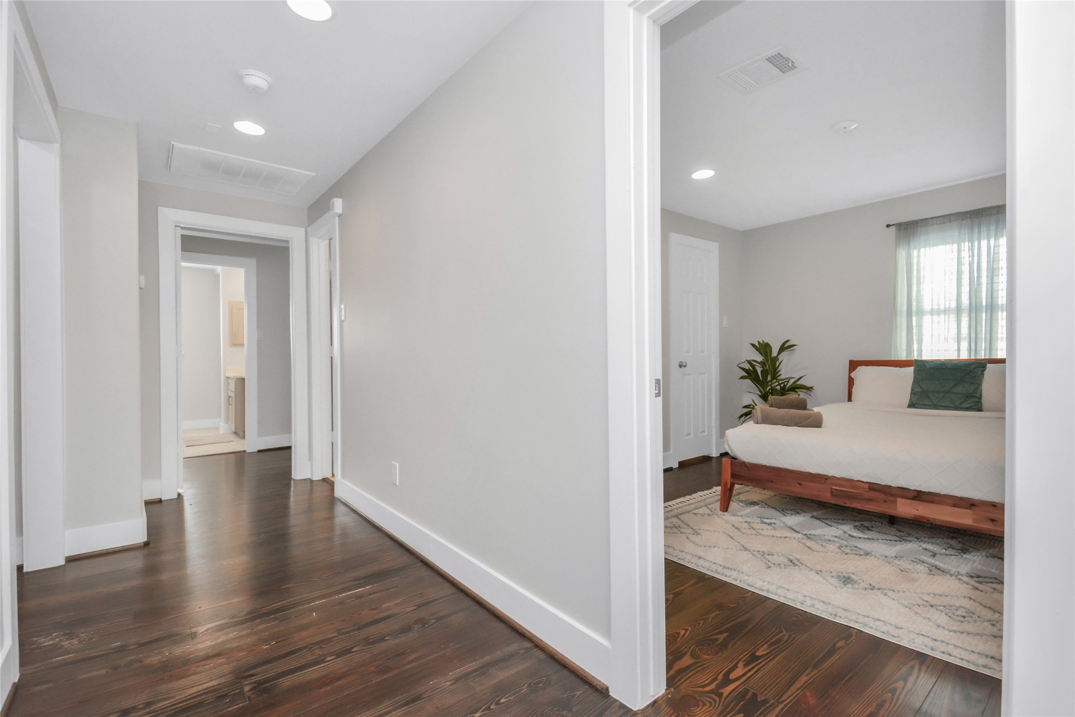 5705 Cochran Street Houston, TX 77009 - Photo 30 of 34 a living room with furniture and wooden floor