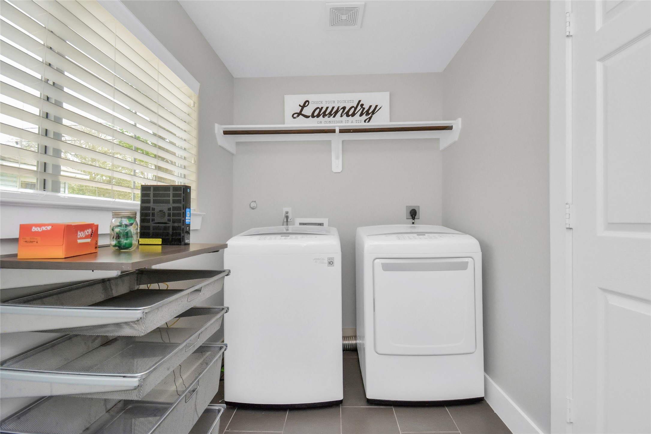 5705 Cochran Street Houston, TX 77009 - Photo 31 of 34 a utility room with dryer and washer