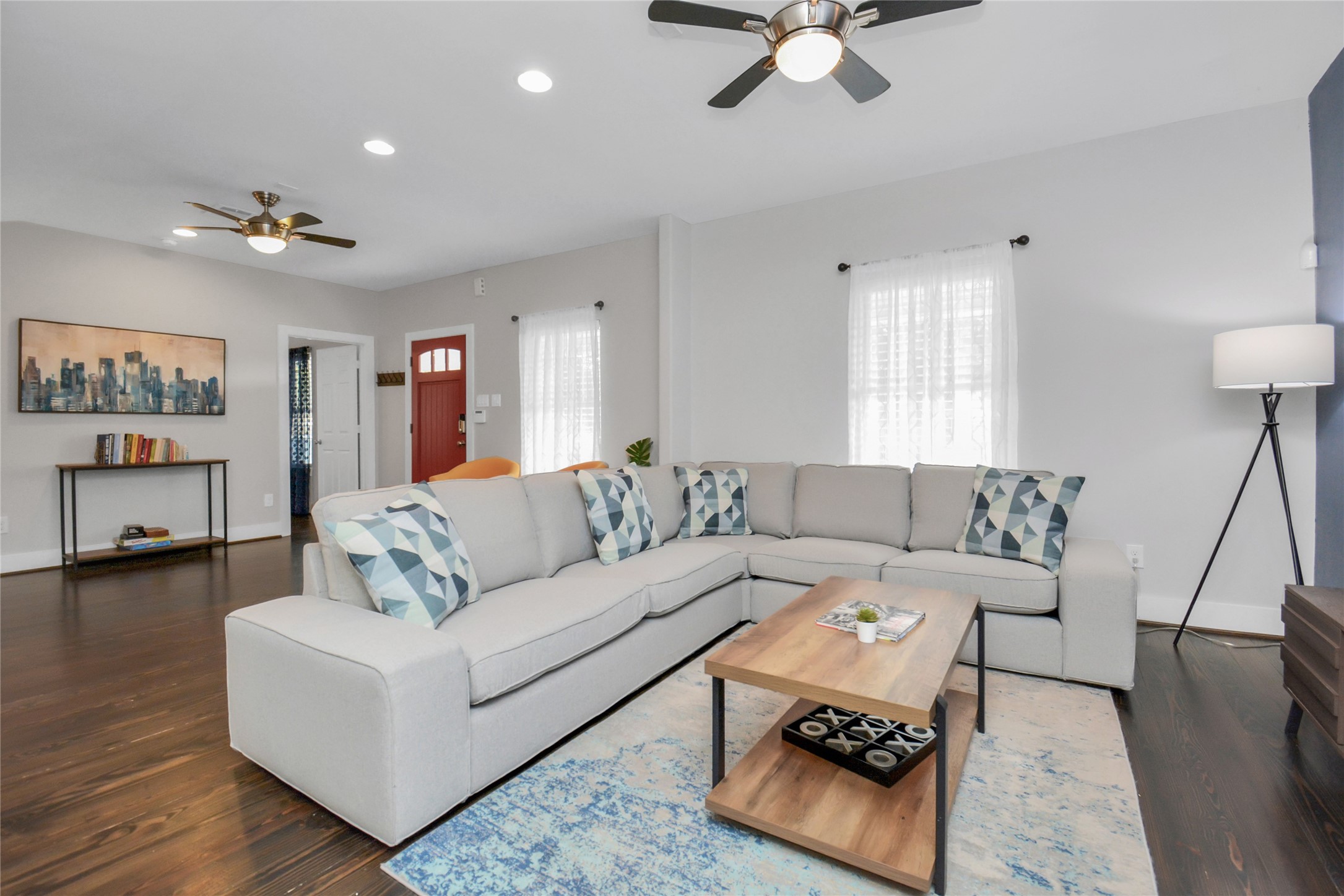 5705 Cochran Street Houston, TX 77009 - Photo 5 of 34 a living room with furniture and a wooden floor