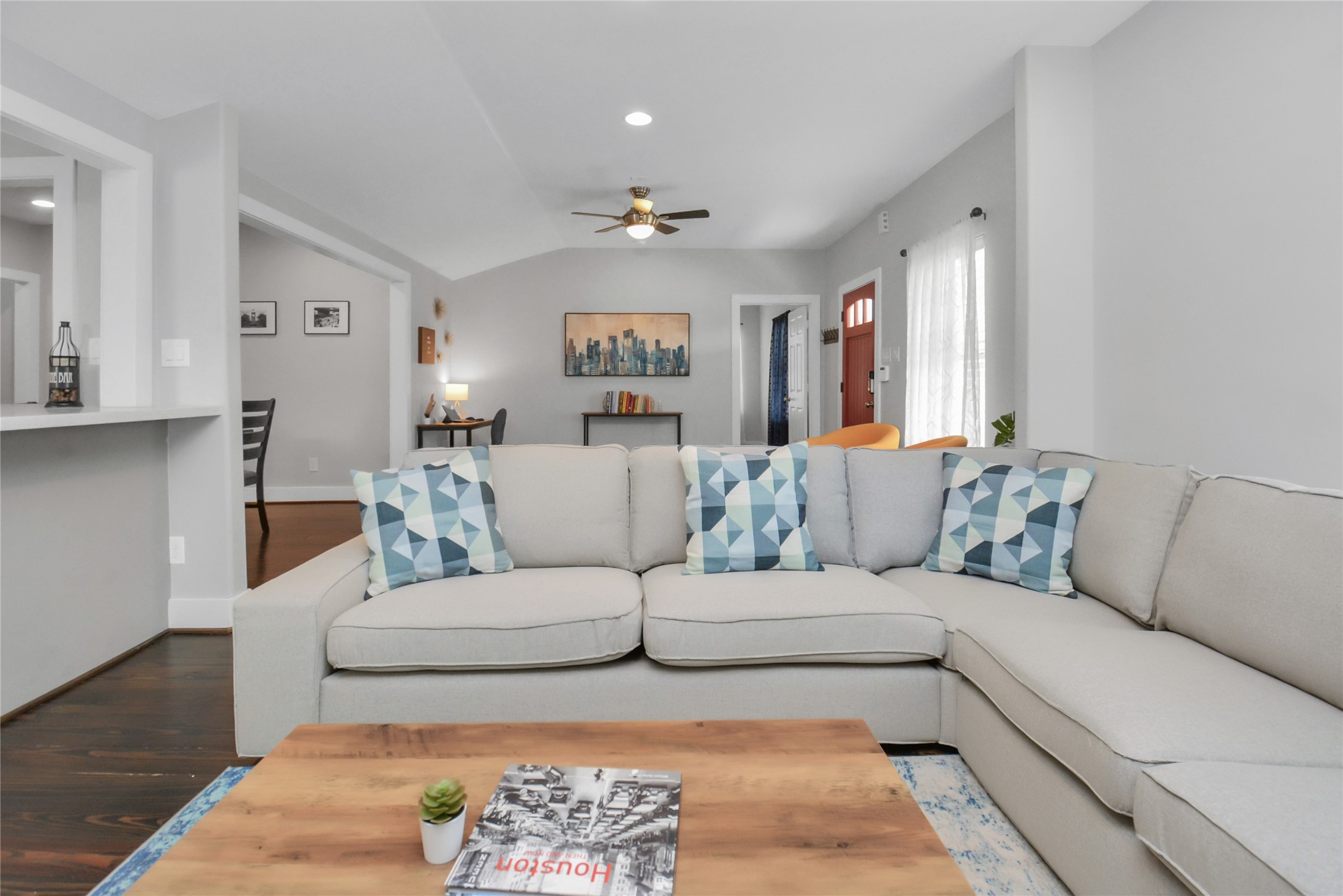 5705 Cochran Street Houston, TX 77009 - Photo 8 of 34 a living room with furniture and a rug