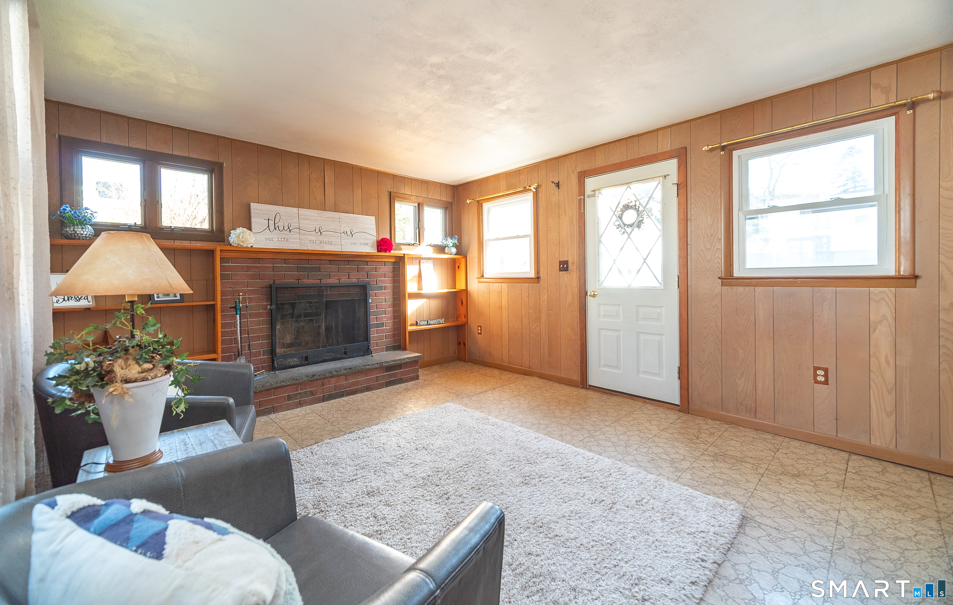 20 Prospect Street Middletown, CT 06457 - Photo 11 of 30 a living room with furniture and a fireplace