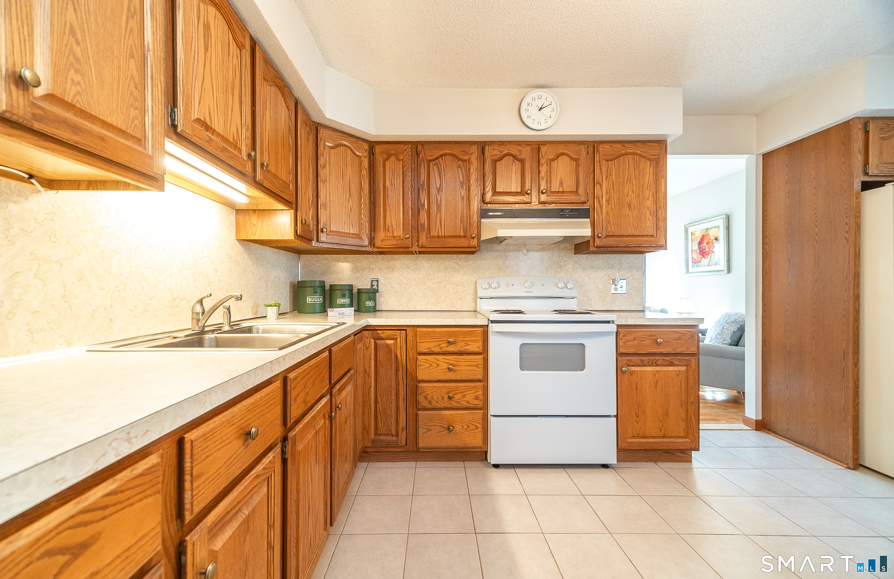 20 Prospect Street Middletown, CT 06457 - Photo 7 of 30 a kitchen with stainless steel appliances granite countertop a stove and a refrigerator