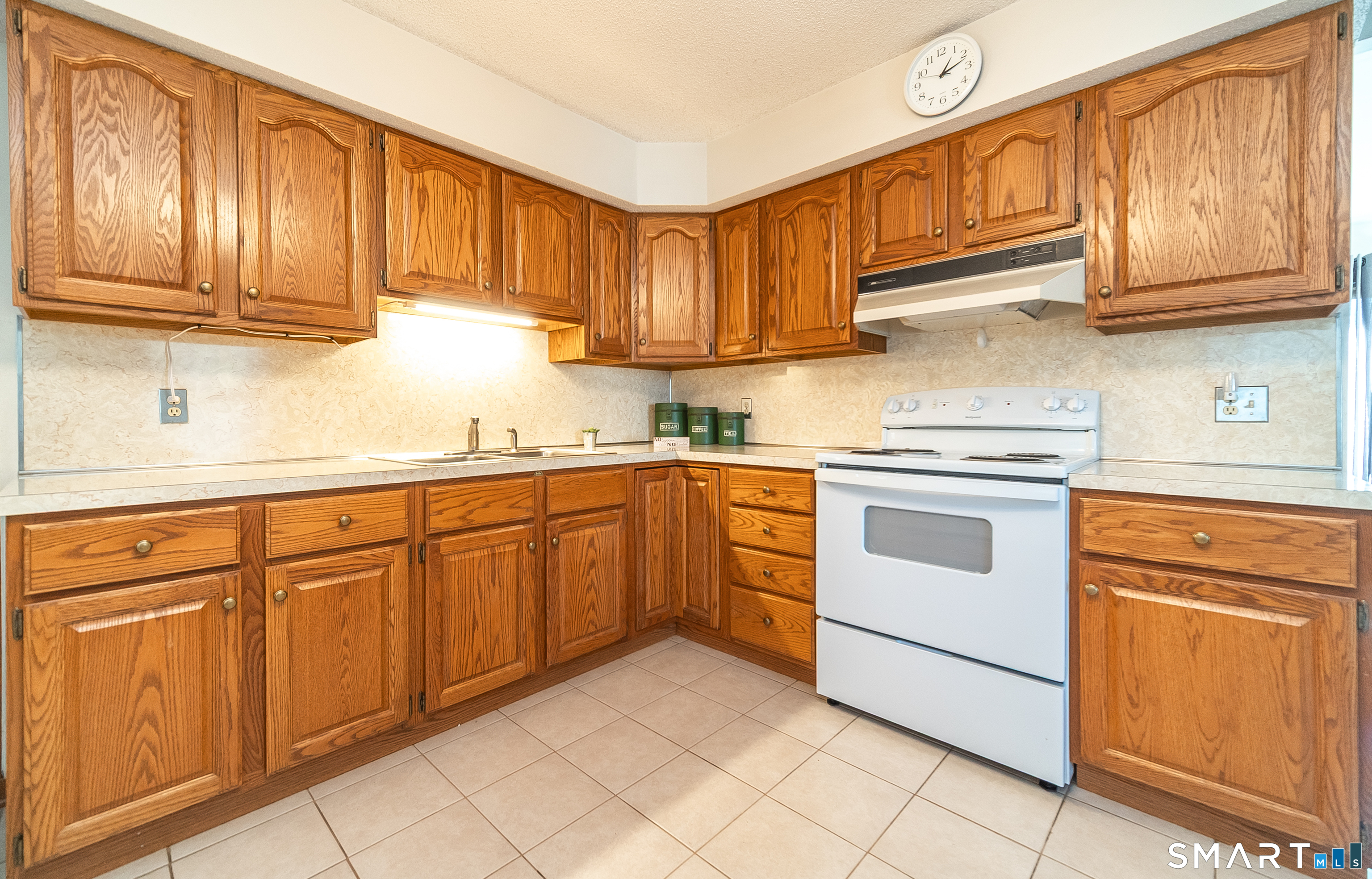 20 Prospect Street Middletown, CT 06457 - Photo 8 of 30 a kitchen with granite countertop cabinets stainless steel appliances and sink