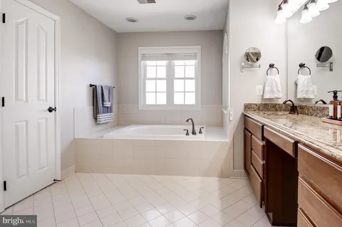 a bedroom with a bed and a cabinets