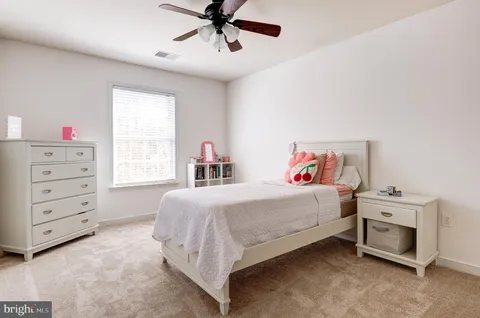a bathroom with a sink a vanity and a mirror