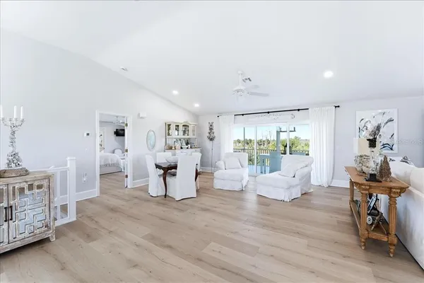 a room with furniture and wooden floor