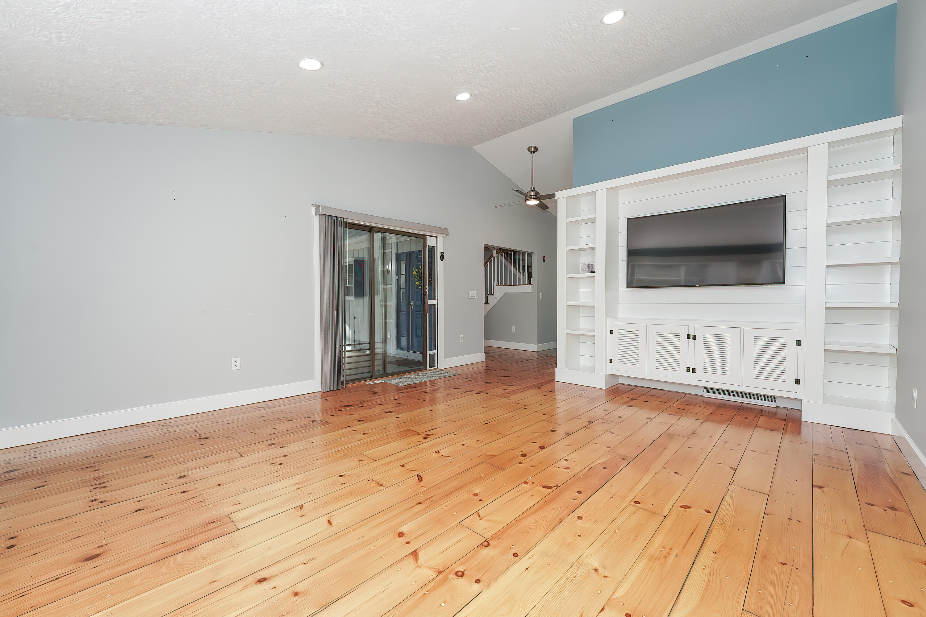 240 Oak Street West Barnstable, MA 02668 - Photo 14 of 89 a view of a livingroom with wooden floor and a flat screen tv