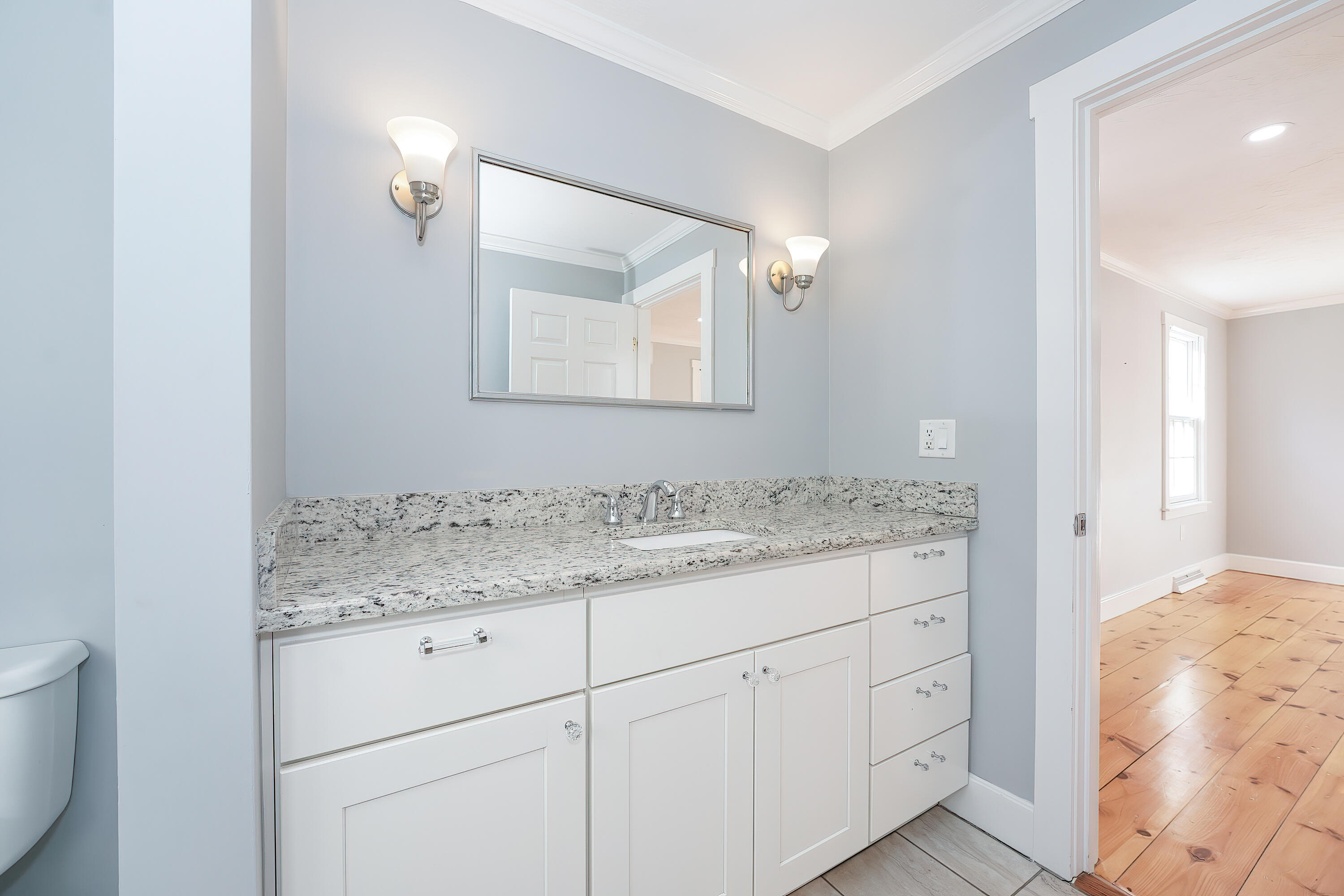 240 Oak Street West Barnstable, MA 02668 - Photo 27 of 89 a bathroom with a granite countertop sink and a mirror