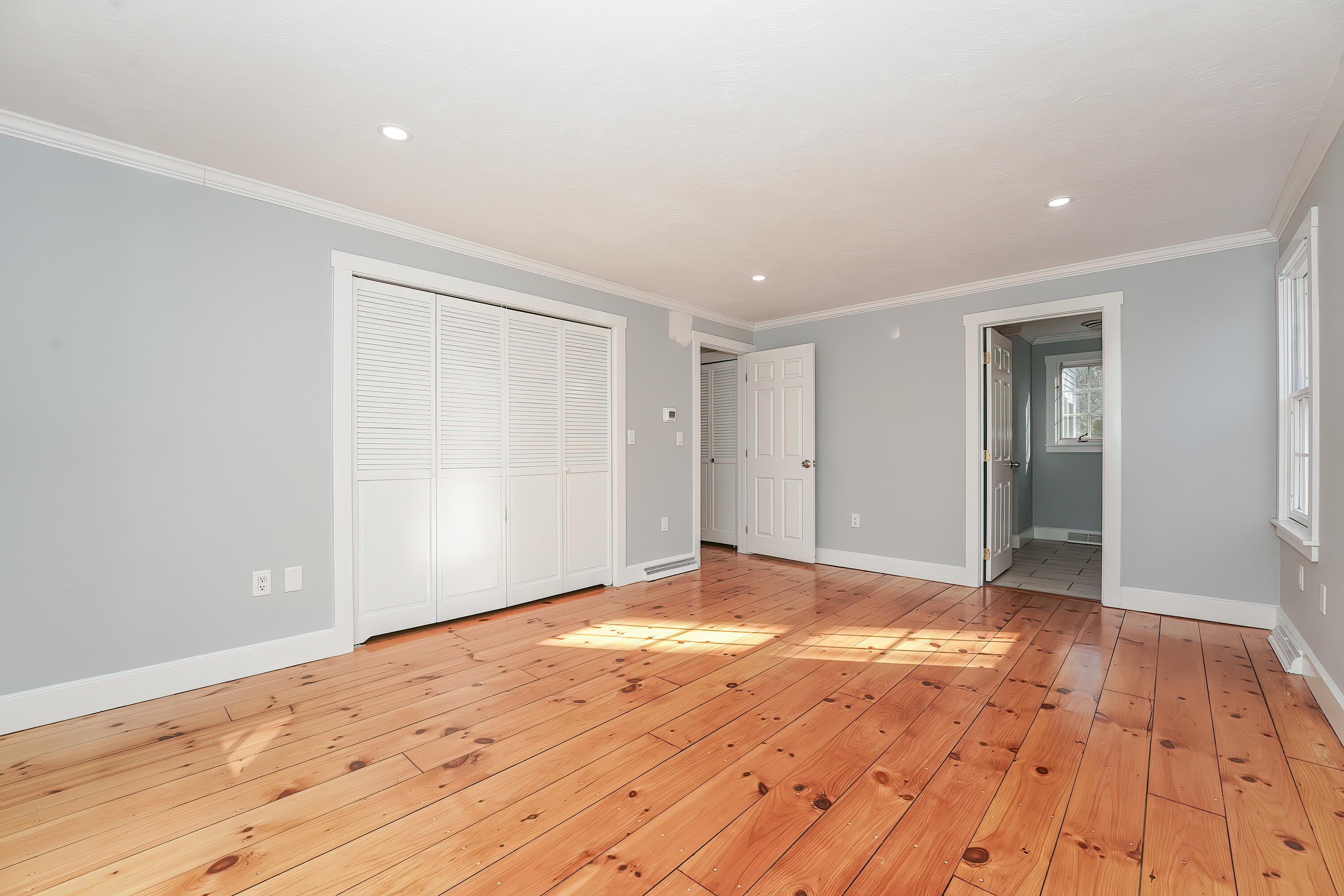 240 Oak Street West Barnstable, MA 02668 - Photo 33 of 89 a view of an empty room and wooden floor
