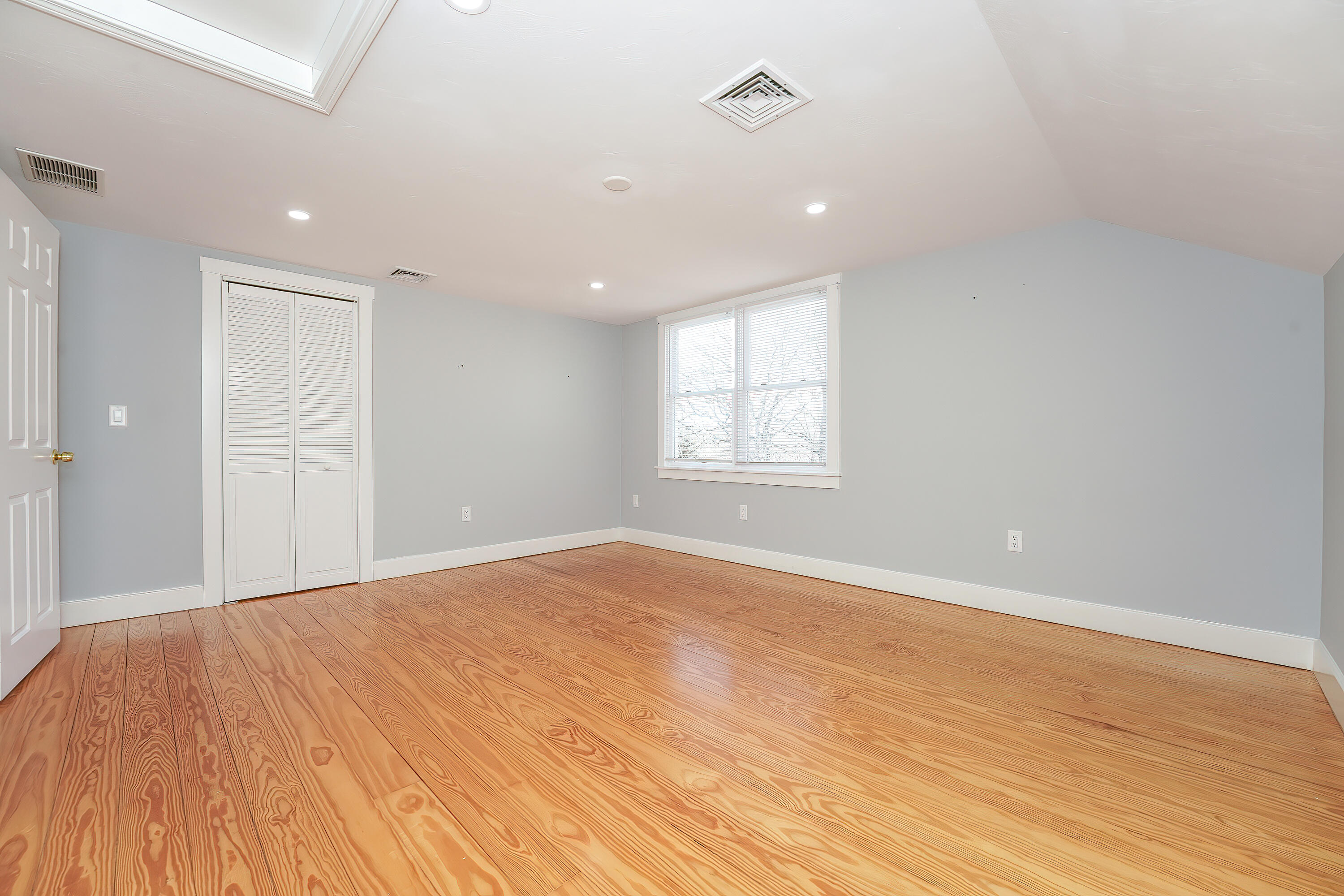240 Oak Street West Barnstable, MA 02668 - Photo 39 of 89 wooden floor in an empty room with a window