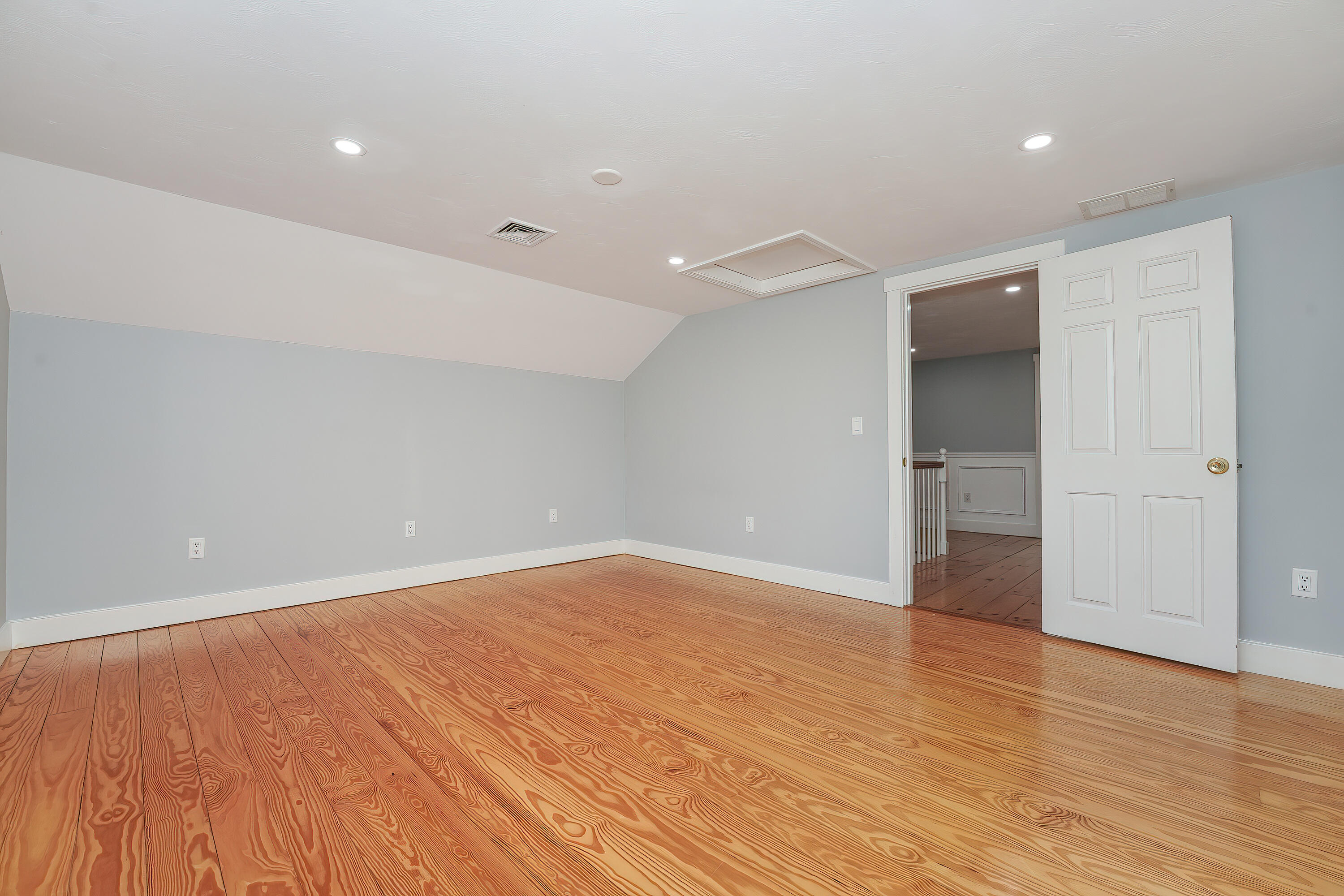 240 Oak Street West Barnstable, MA 02668 - Photo 41 of 89 a view of an empty room with wooden floor and closet